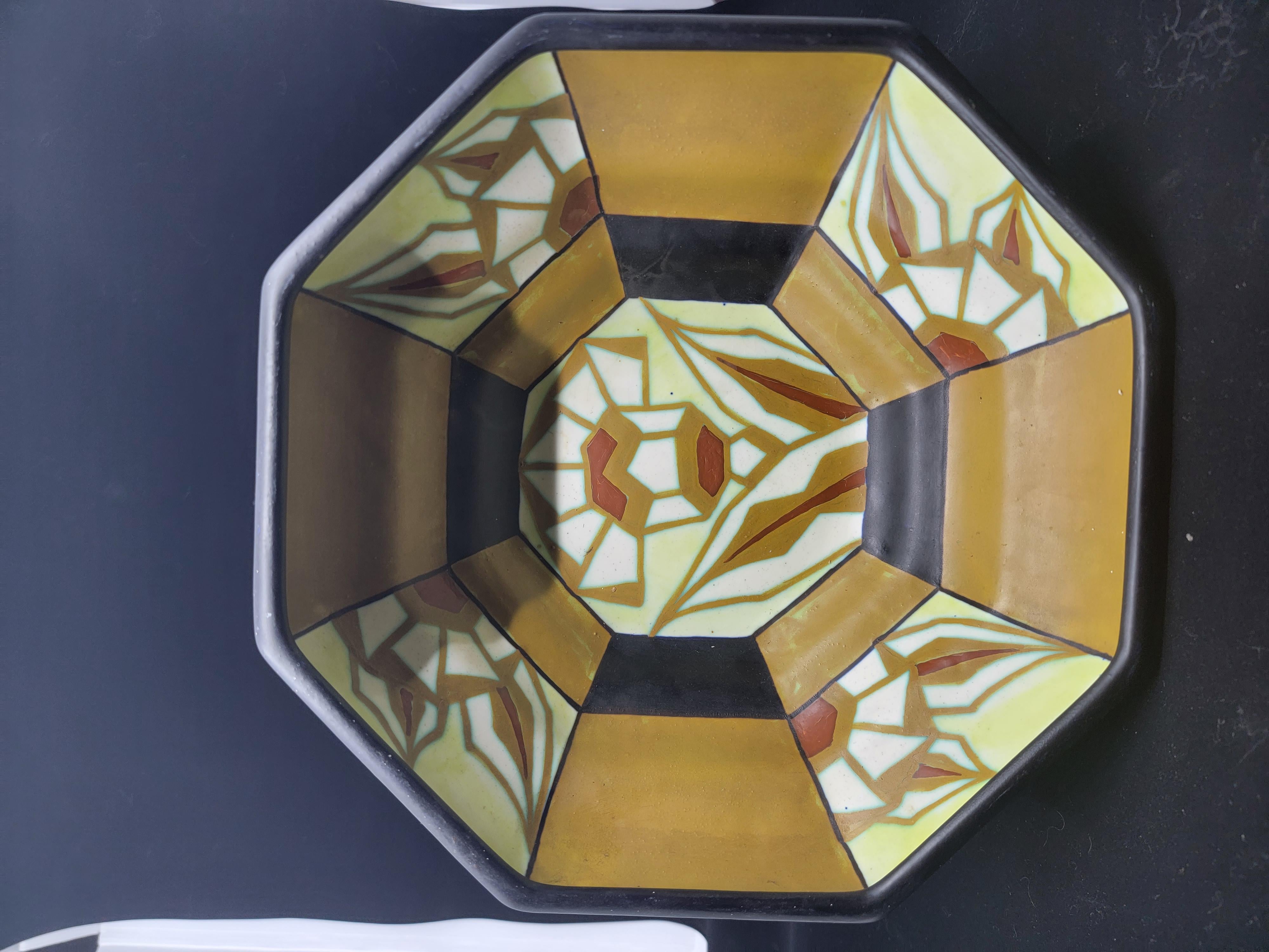 Although rare this bowl is already available from another vendor. It would seem to me that you should buy them both and have wonderful dinner parties with these a the central focus of your design. Art deco inspired and origin Boch Freres was a