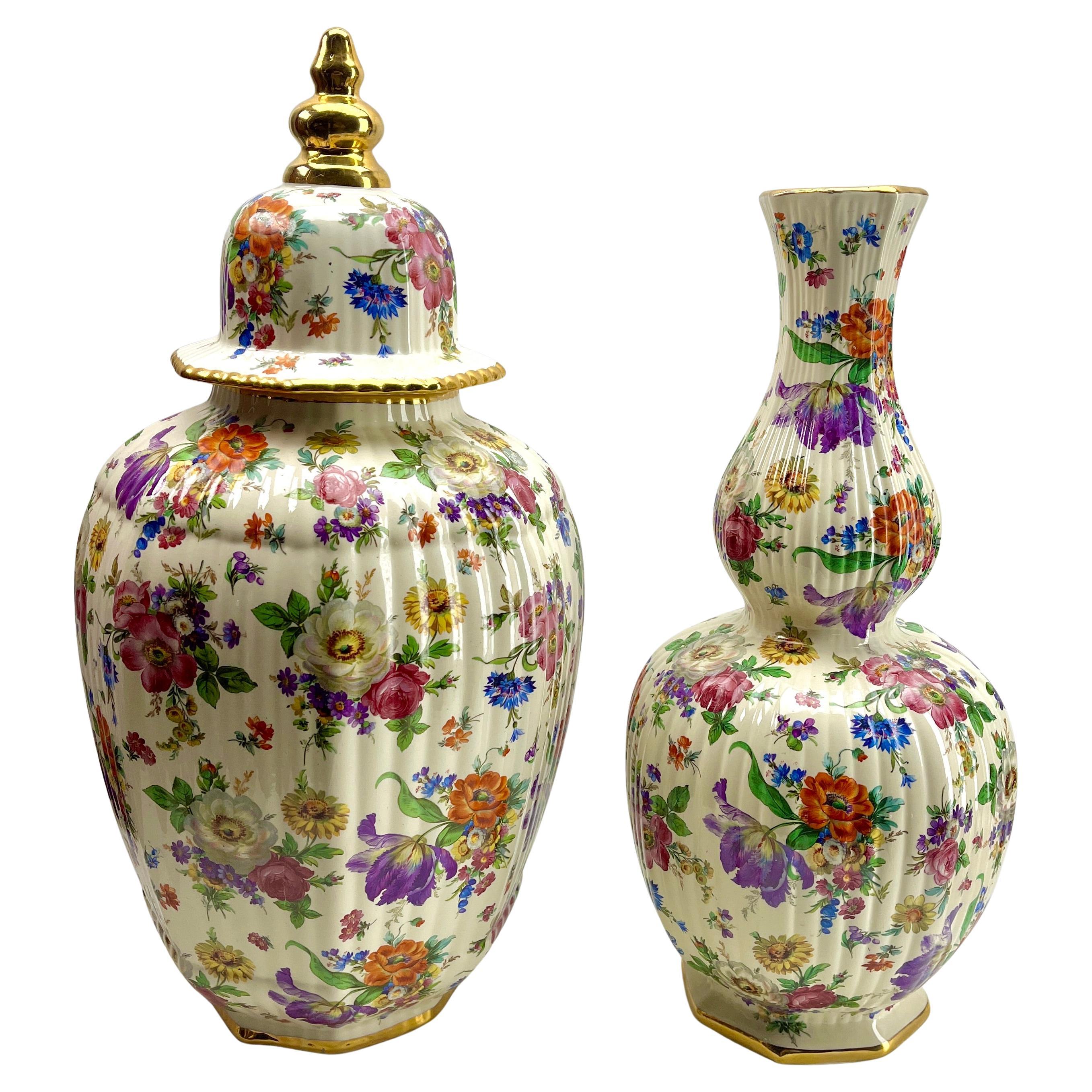 Boch Freres Keralux Stamp and Label set of 3 Large Ceramics Vase, Urn and Plate
Label Boch and Stamp , decorated Flowers with coloured lead glazes. 

Measure: 
Urn: 51 cm x 21 cm
Vase: 44 cm x 21 cm
1 dish: 41 cm x 29 cm x 9 cm

Looks simply