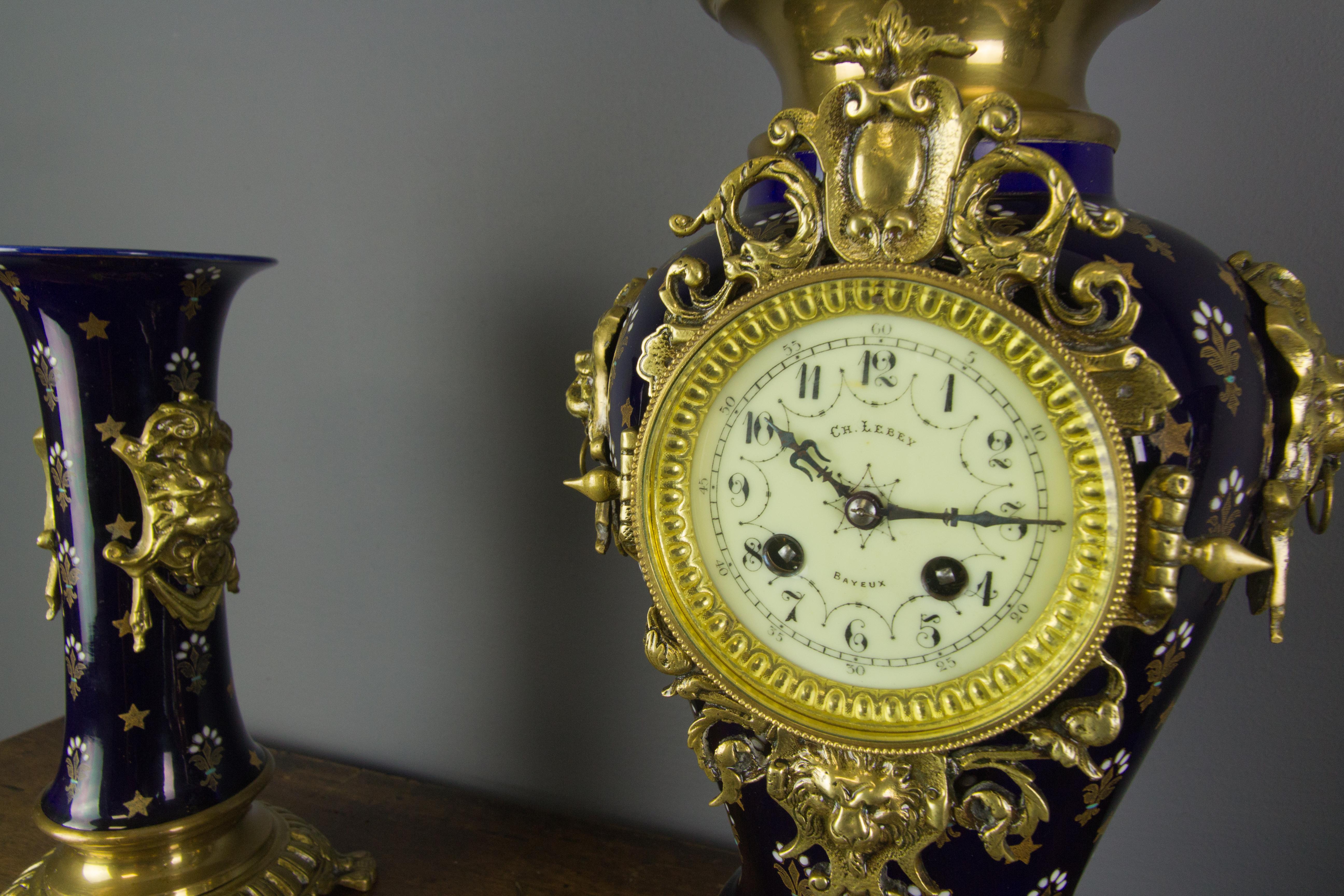 Boch Frères Keramis Royal Blue Three-Piece Clock Garniture, Early 20th Century For Sale 9
