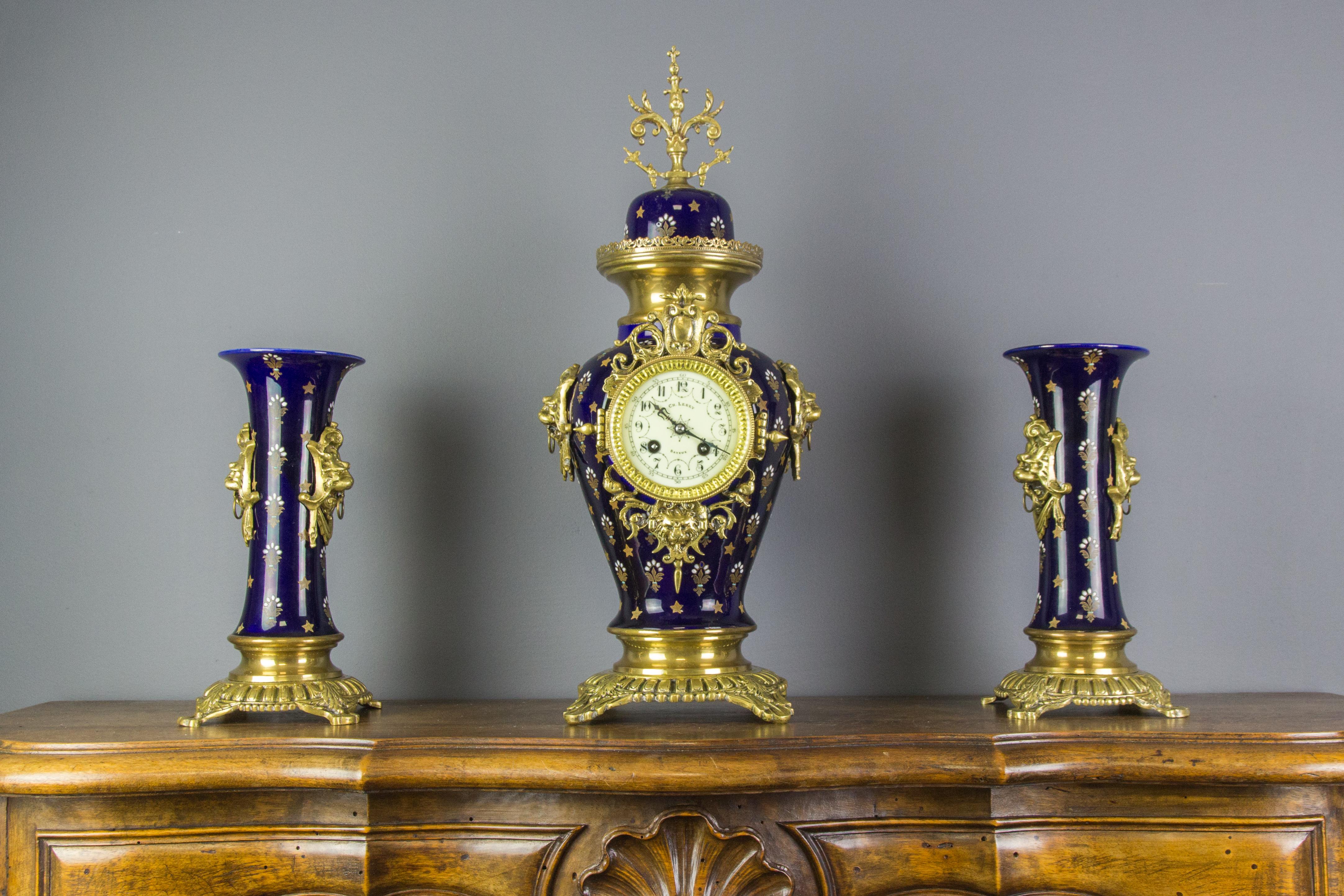 Louis XVI Boch Frères Keramis Royal Blue Three-Piece Clock Garniture, Early 20th Century For Sale