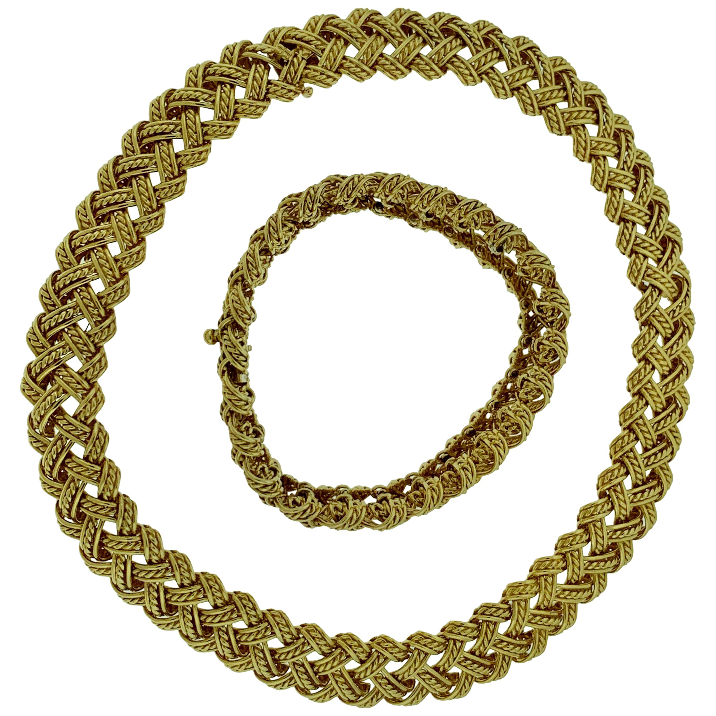 Collier et bracelet deux pièces Bocheron en or jaune 18 carats 165 grammes