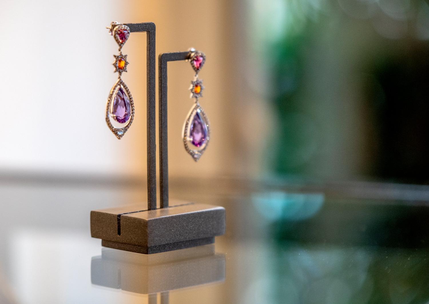 This is the ultimate night out accessory, they are light, fancy earrings that make a statement but are also fun. 
Bochic Candy Drop Gems:
Amethyst Pear shaped drops 
Mandarin garnet Rounds 
Rublite triangle shaped Tops 
Moonstones 
Diamonds - F