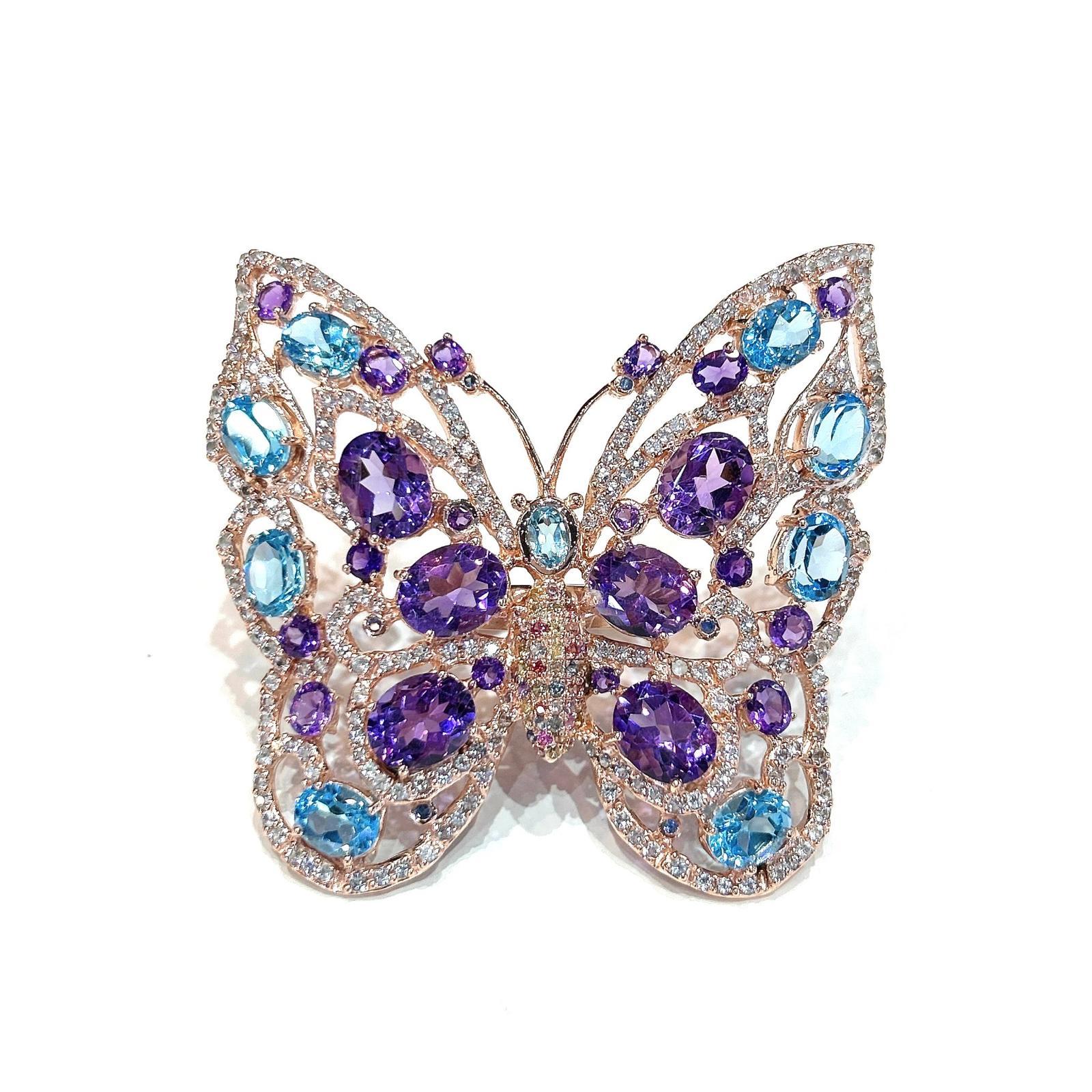 Bochic “Capri” Amethyst & Blue Topaz Butterfly Ring Set In 18K Gold & Silver 

Natural Amethyst - 14.00 carats 
Natural Multi White Topaz - 3.00 carats 
Natural Blue Topaz - 12,00 carats 

This Ring is from the 