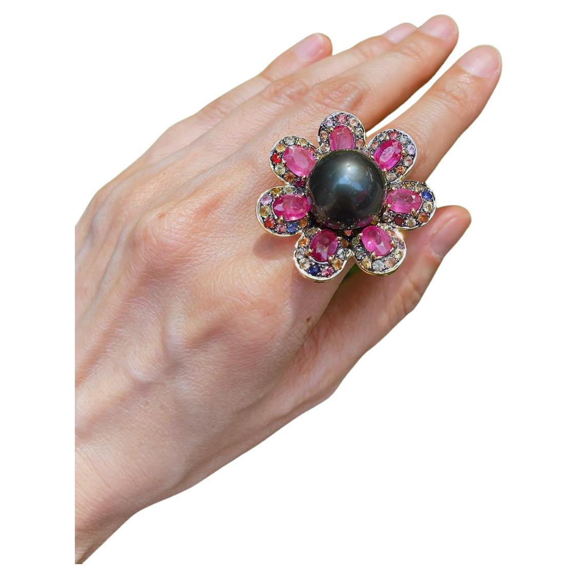 Bochic “Capri” Black Pearl & Pink Sapphire Cocktail Ring Set In 22K Gold & SilveR 
Beautiful Natural Tahiti Black Pearl
Natural Multi Color Sapphires from Sri Lanka - 3 carats 
Round and oval brilliant shapes 
Pink sapphire - Oval shapes 
This Rings