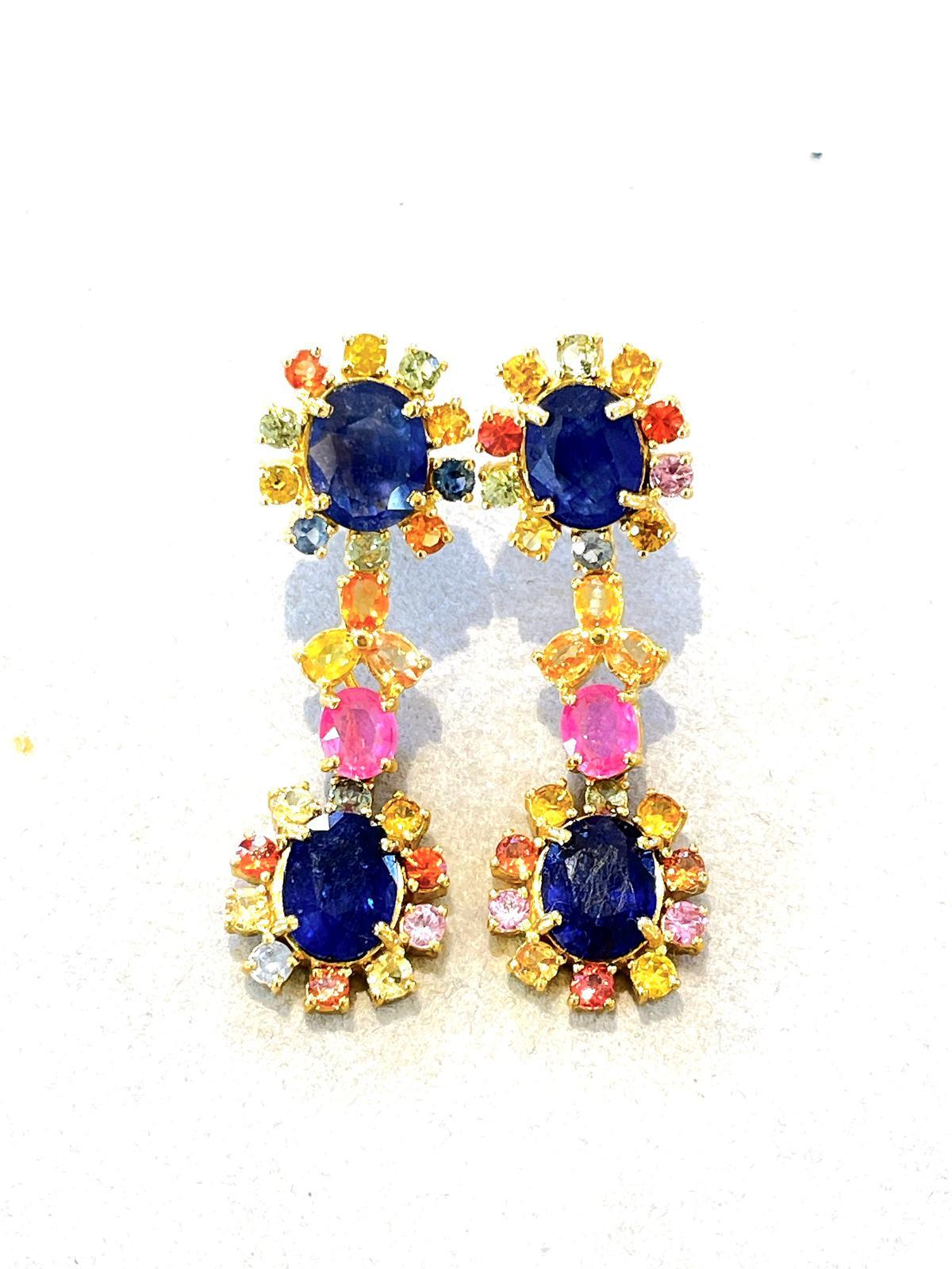 Bochic “Capri” Blue & Multi Sapphire & Ruby Earrings Set In 18K Gold & Silver 

Natural Blue Sapphires, Oval Shapes from Sri Lanka 
12 Carat 
Natural Multi color Sapphires from Sri Lanka 
Colors - Green, Orange, Purple, Blue, Yellow 
6 Carat