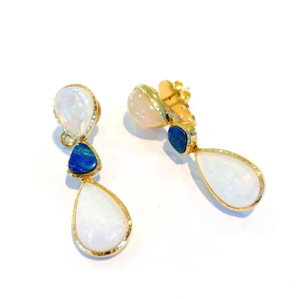 Bochic “Capri” Blue & White Opal Earrings Set In 18K Gold & Silver 
Australian Natural Blue Opal - 2 Carats 
Natural shapes 
Ethiopian Natural White Opal - 21 Carats 
Pear shapes 
The earrings are from the 