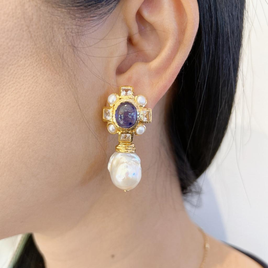Bochic “Capri” Classic, Sapphire, Topaz & Pearl Earrings Set In 18K Gold & Silver
Blue Natural Cabochon Sapphires from Sri Lanka - 12 Carats 
White Natural Square cut Topaz - 7 Carats 
South sea Baroque Pearls Whit color with Pink tone 

The