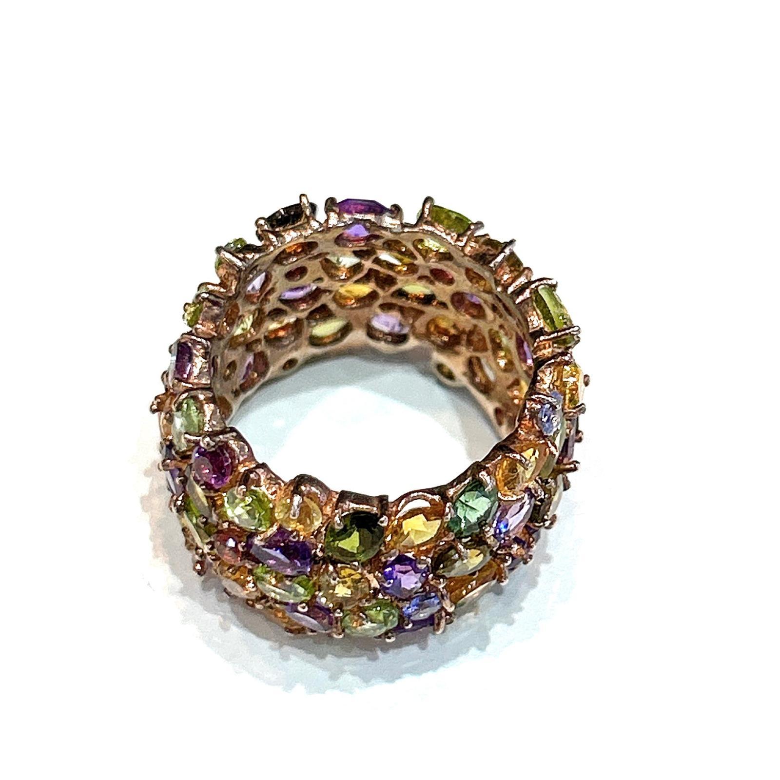Bochic “Capri” Multi Color Tourmalines & Amethyst  Ring Set In 18K Gold & Silver 

Natural Multi Color Tourmalines  - 3.00 carats 
Nautural Amethyst- 2.00 carats 
Natural Blue Topaz - 1,00 carats 

This Ring is from the 