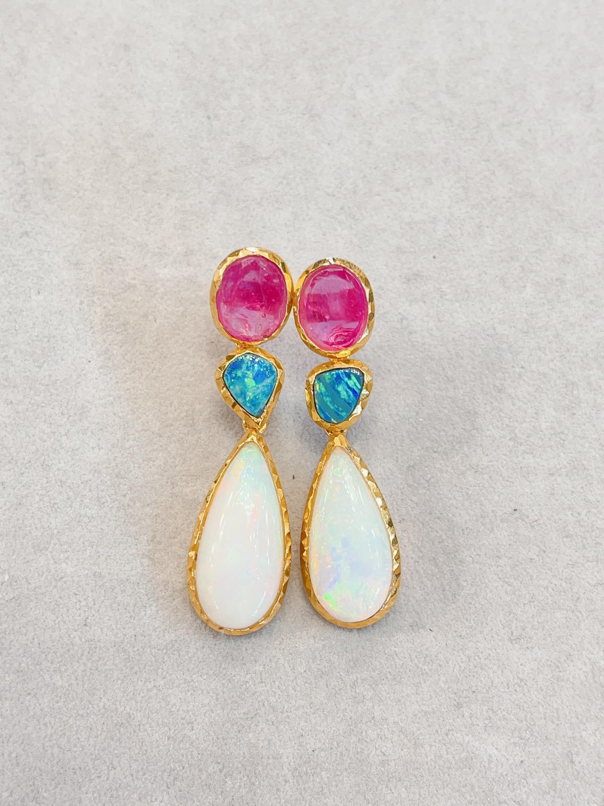 Bochic “Capri” Multi Natural Gem Earrings 
Set in 22K Gold and Silver 
Natural Ruby, Colors - Red, Pink - 7 Carats 
Shape - Oval Shape
Ethiopian White Opal and Australian Blue Opal - 8 Carats 
Blue opals shape - natural 
White opal shape - tear