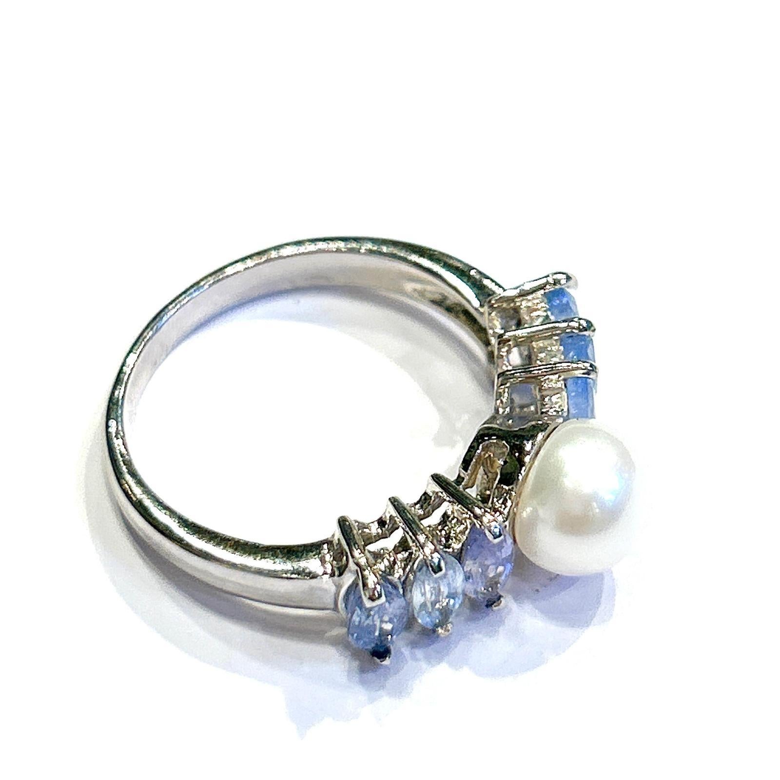 Bochic “Capri” Multi Tanzanite & Akoya Pearl Ring Set In 18K Gold & Silver

Natural Multi Tanzanite - 2.00 carats 
Nautural Akoya Pearl 

This Ring is from the 