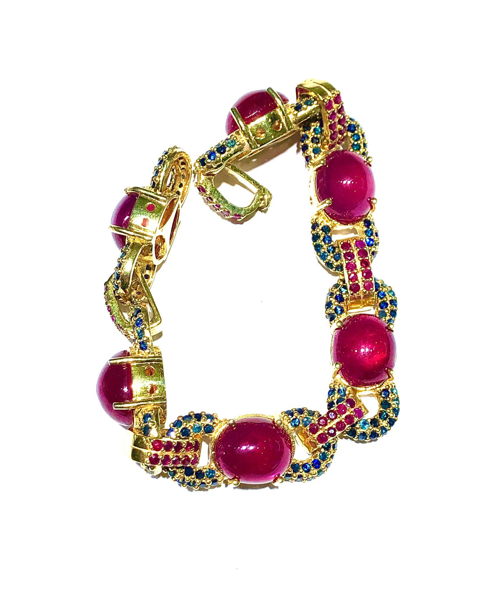 Bochic “Capri” Multi Sapphire & Ruby Bracelet Set In 18K Gold & Silver

Natural Ruby cabochons
12 Carats
Natural Round Brilliant Blue Sapphires
5.00 Carats 
Natural Round Brilliant Rubies 
2.00 Carats 

This Bangle is from the 