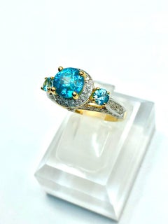 Anello Bochic "Capri" con zirconi cambogiani naturali e diamanti incastonati in oro e seta 18 carati