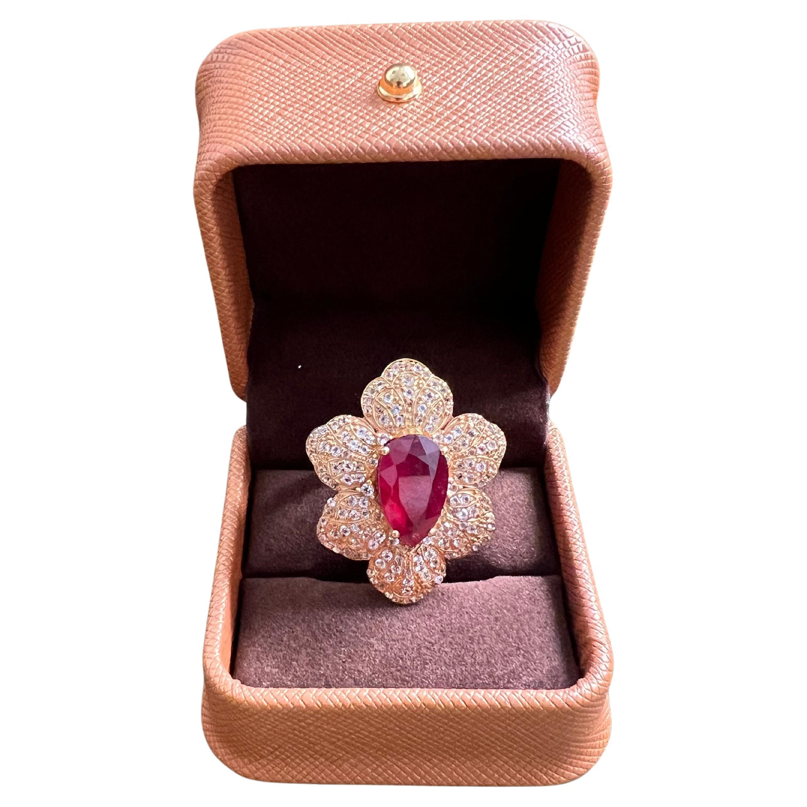 Bochic “Capri” Natural Red Ruby & Topaz Ring Set In 18K Gold & Silver 

Ruby - 14 carat 
White Topaz  - 4 carat 

This Ring is from the 