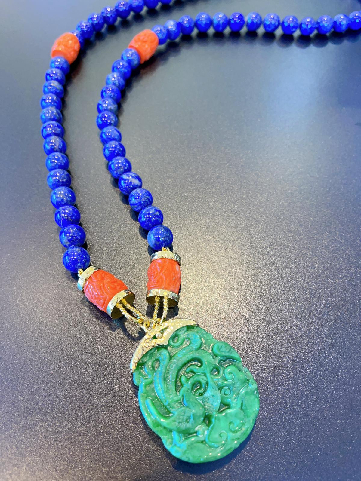 Bochic “Orient” Necklace,  Green Jade, Coral & Lapis Set In 22K Gold & Silver 
Bochic “Capri” Natural Gem Necklace
Natural Blue Lapis round beads 
Salmon Coral Beads 
Green Crafting Jade 
Set in 22K Gold and Silver 
This Necklace is perfect cross