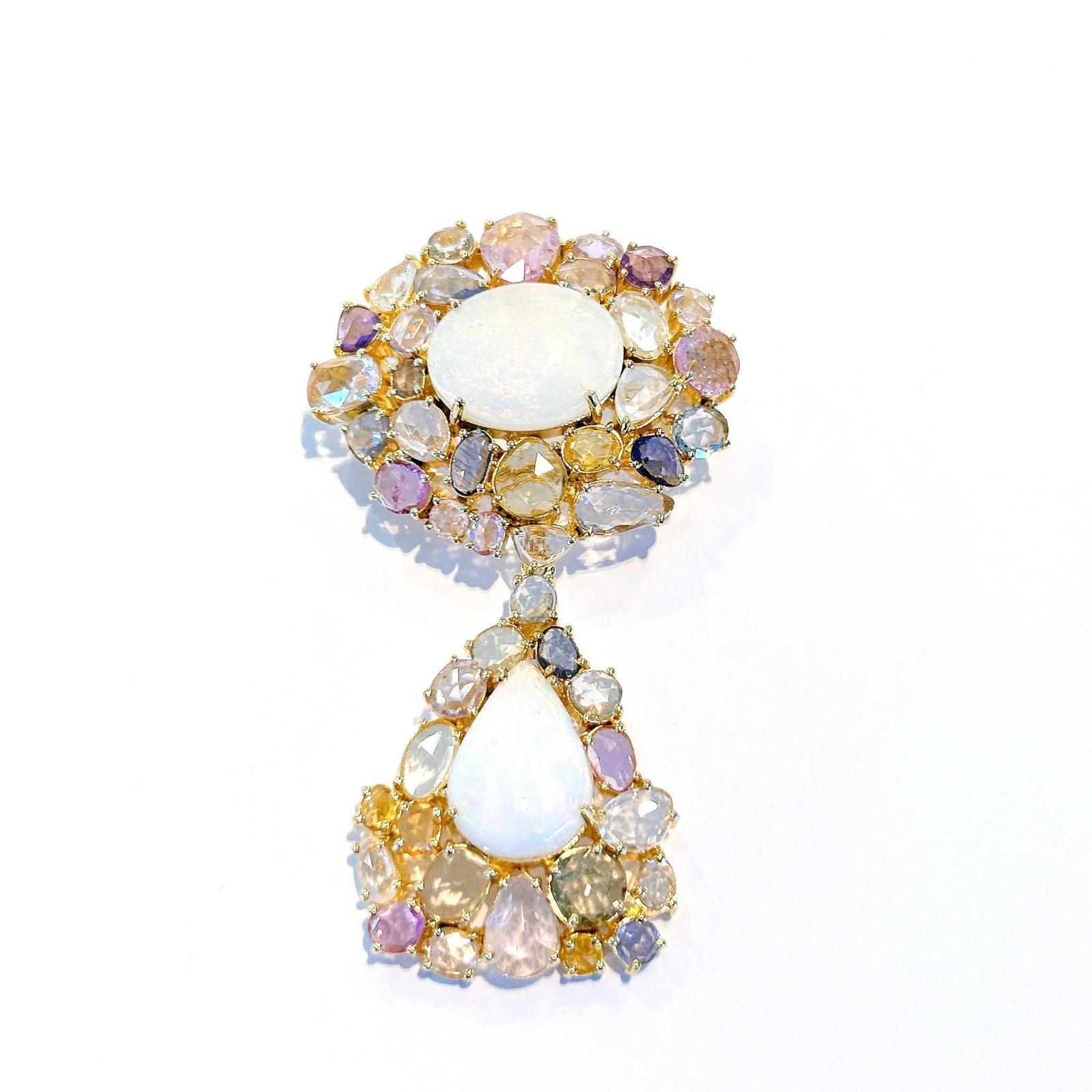 Bochic “Capri” Opal & Multi Fancy Rose Sapphires Pendent Set 18K Gold & Silver 
Rose Cut Sapphires 16 carats 
Colors: Rose, Pink, Purple, Yellow, Golden, Light Green, Lilac 
From Sri Lanka 
White Opal with Cream and Pink tones 
Cabochons shapes
The