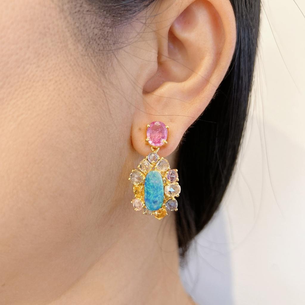 Bochic “Capri” Opal, Rose Cut Sapphires & Pearl Earrings Set 18K Gold & Silver 
Natural Red Ruby, Oval shapes 
Carats 
Natural Rose Cut Multi color Sapphires from Sri Lanka 
5 Carats 
Sapphire colors: Pink, Green, Lilac, Yellow, Green, Pink
Natural