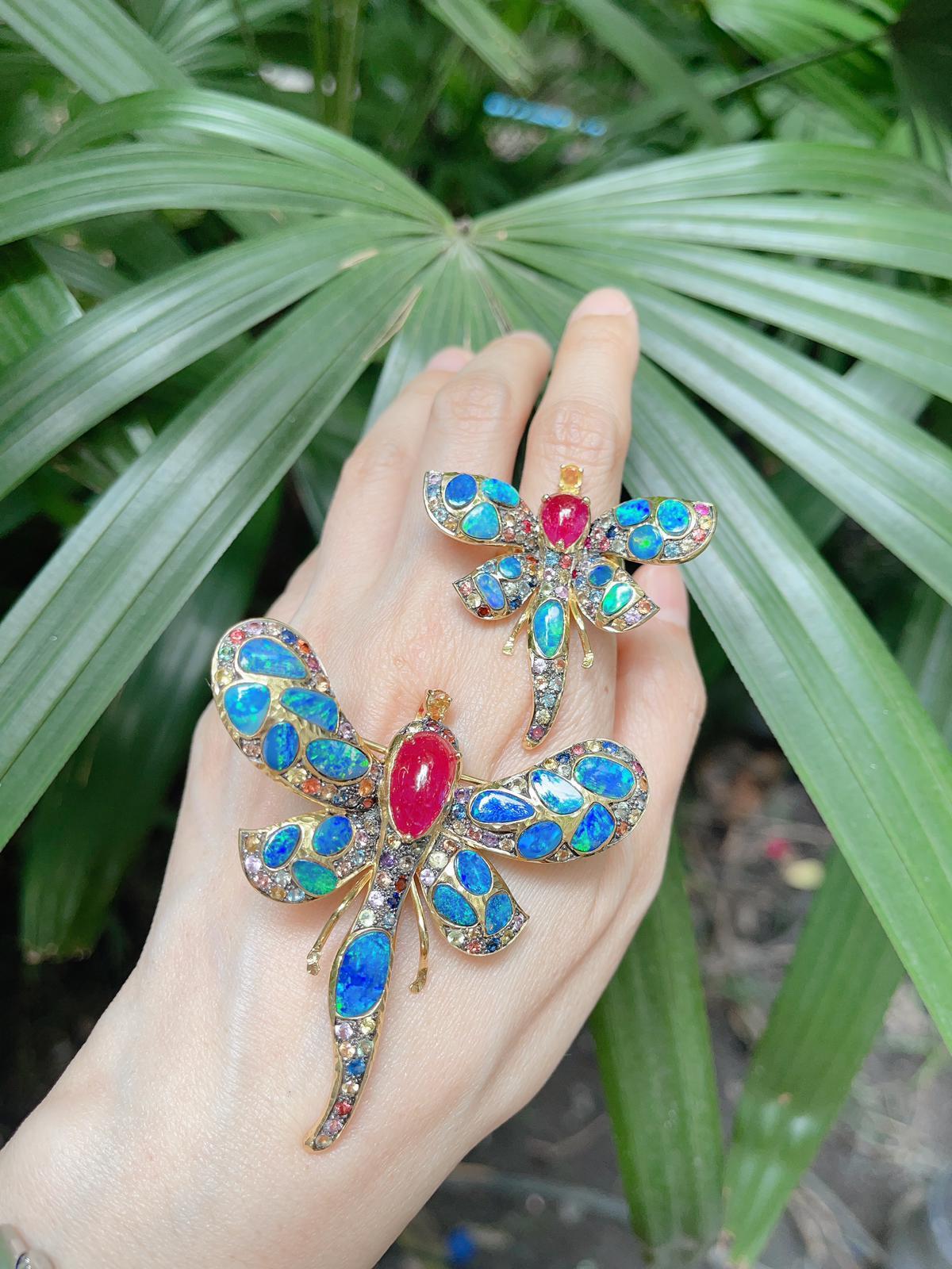 Bochic “Candy Butterfly” Blue Fire Opal, Ruby & Sapphire Ring 
From the “Capri” collection 
Natural Opals - 10 carats 
Natural shapes 
Natural Ruby Cabochon - 5 carats 
Pear shape 
Natural Fancy color sapphires, round brilliant  - 4.5 carat 
Sri