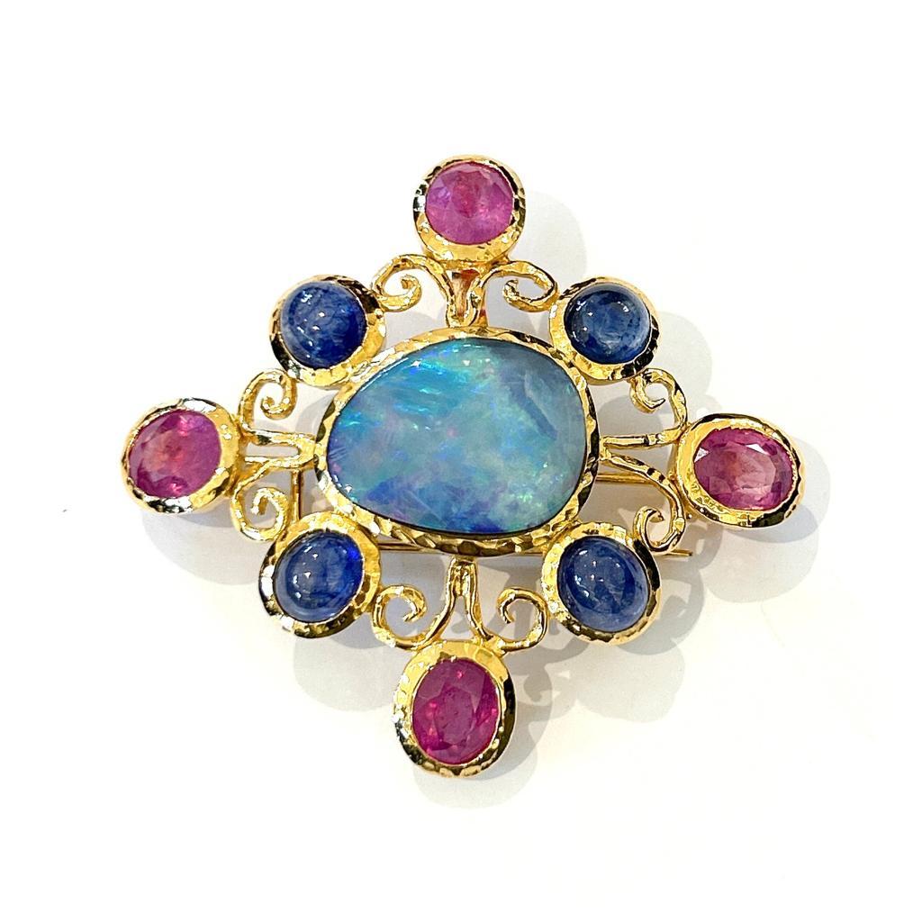 Bochic “Capri” Opal, Sapphire & Ruby Brooch Set In 18K Gold & Silver 

Blue Opal from Australia - 11 Carat 
Blue Sapphire from Sri Lanka - 15 Carat 
Red Ruby from Burma - 9 Carat 

The Bochic 
