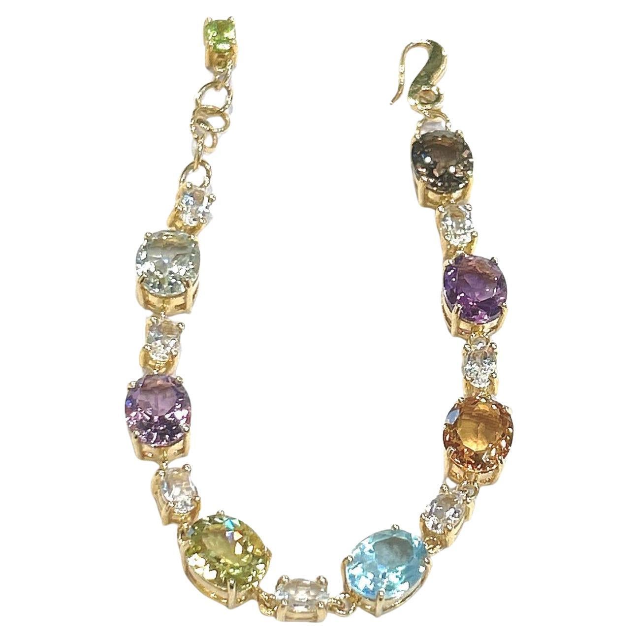 Bracciale con peridoto e gemme multicolore 