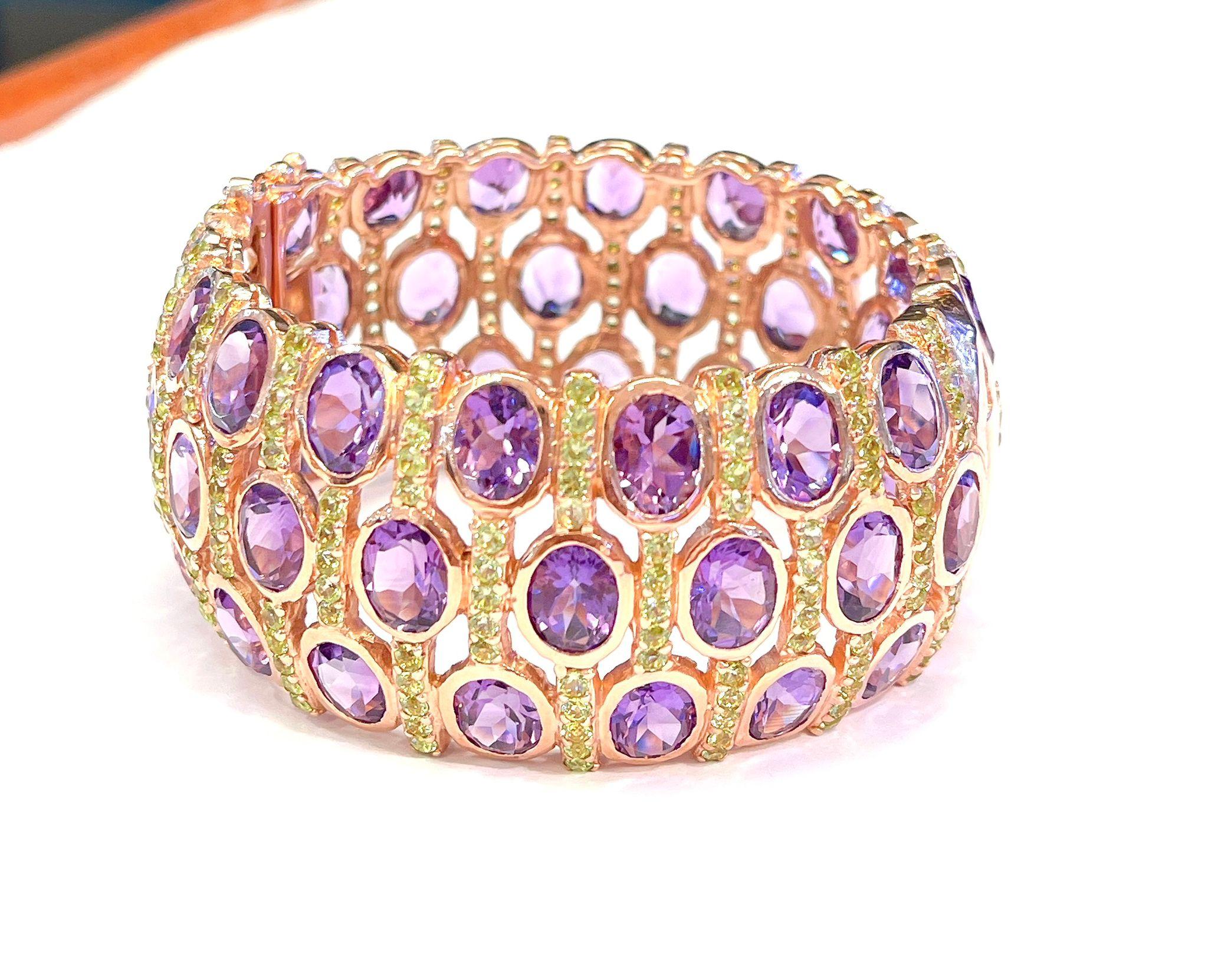 Bochic “Capri” Purple Amethyst & Green Amethyst Cuff Set In 18K & Silver 

Purple Amethyst ovals - 20 Carats 
Green Amethyst Rounds - 5 Carats 

The Bochic 