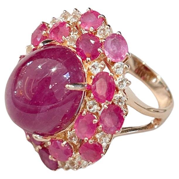 Bochic “Capri” Red Hot Ruby & White Topaz Ring Set in 18K Gold & Silver 

Natural Oval Cut Rubies - 14 carats 
Natural Cabochon Ruby - 12 Carats 

This Ring is from the 