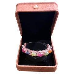 Conjunto de brazalete Bochic "Capri" de rubí rojo y zafiros multicolor en oro de 18 quilates y plata
