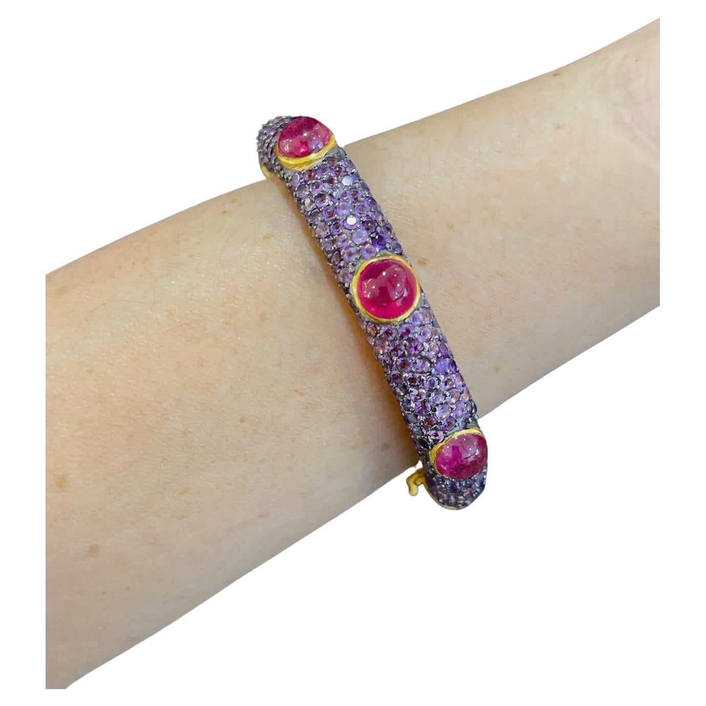 Bochic “Capri” Red Ruby & Purple Amethyst Bangle Set In 22K Gold & Silver 
Bochic Multi Gem “Capri” Bangle
The bangle has 2.2 Inch internal dimension and fits an average 7 inch wrist size
It has an open and close clasp and a safety hook
The inside