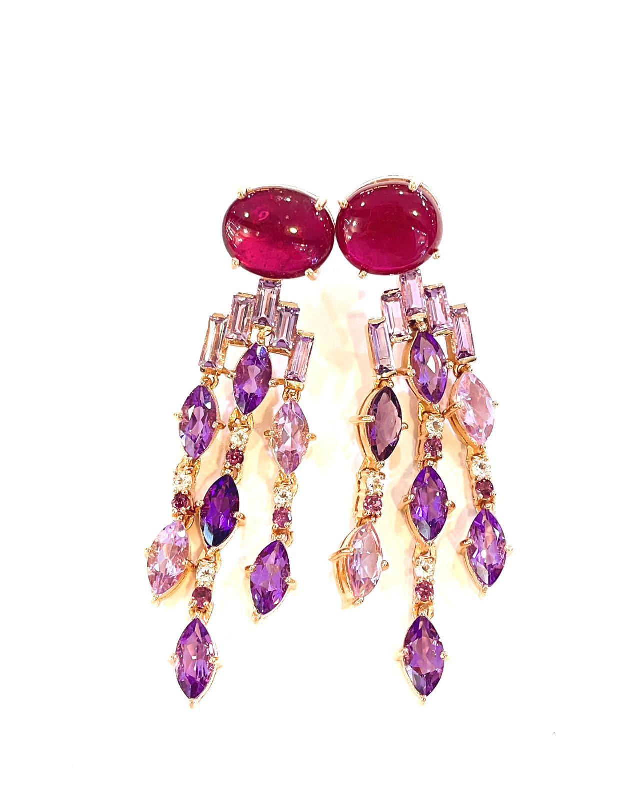 Bochic “Capri” Cascading Red Ruby & Purple Amethyst Earrings Set In 22K Gold & Silver 
Natural Red Ruby Cabochons - 30.28 Carats 
Natural Purple Amethyst - 16.74 Carats 
Red Rodorite and White Topaz - 2.65
Set in 22K Gold and Silver 950
This
