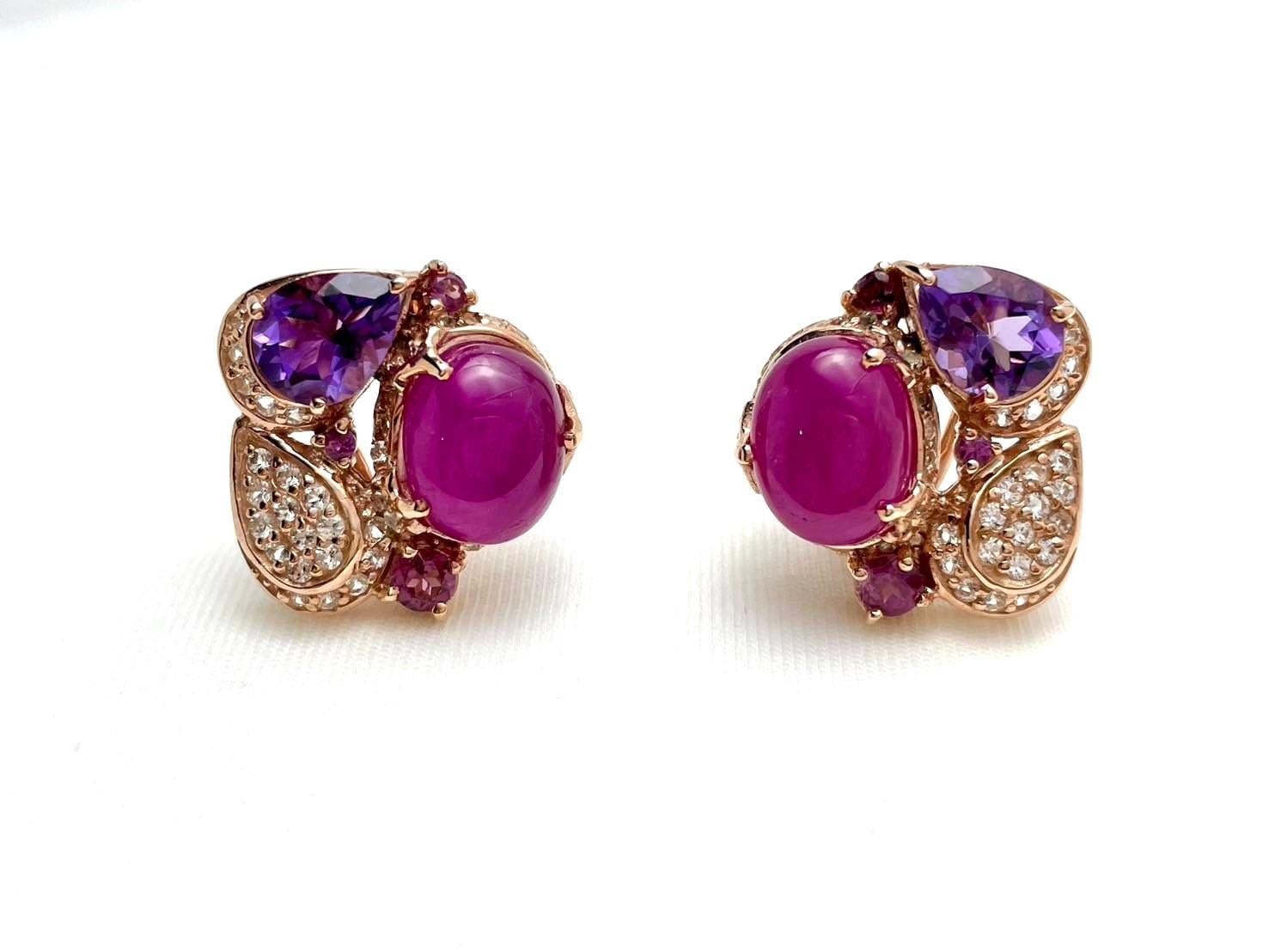 Bochic “Capri” Ruby, Amethyst & White Topaz Earrings Set in 18K Gold & Silver 

Ruby - 5  Carats 
White Topaz - 1 Carats 
Purple Amethyst -3 Carats 

The Bochic 