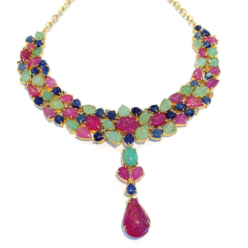 Bochic “Capri” Ruby, Emerald & Sapphire Necklace Set In 18K Gold & Silver 
Red Natural Rubies - 76 Carats 
Green Emeralds - 36 Carats 
From Zambia 
Blue Natural Sapphires - 32 Carats 
From Sri Lanka
A stunning piece of jewelry designed for