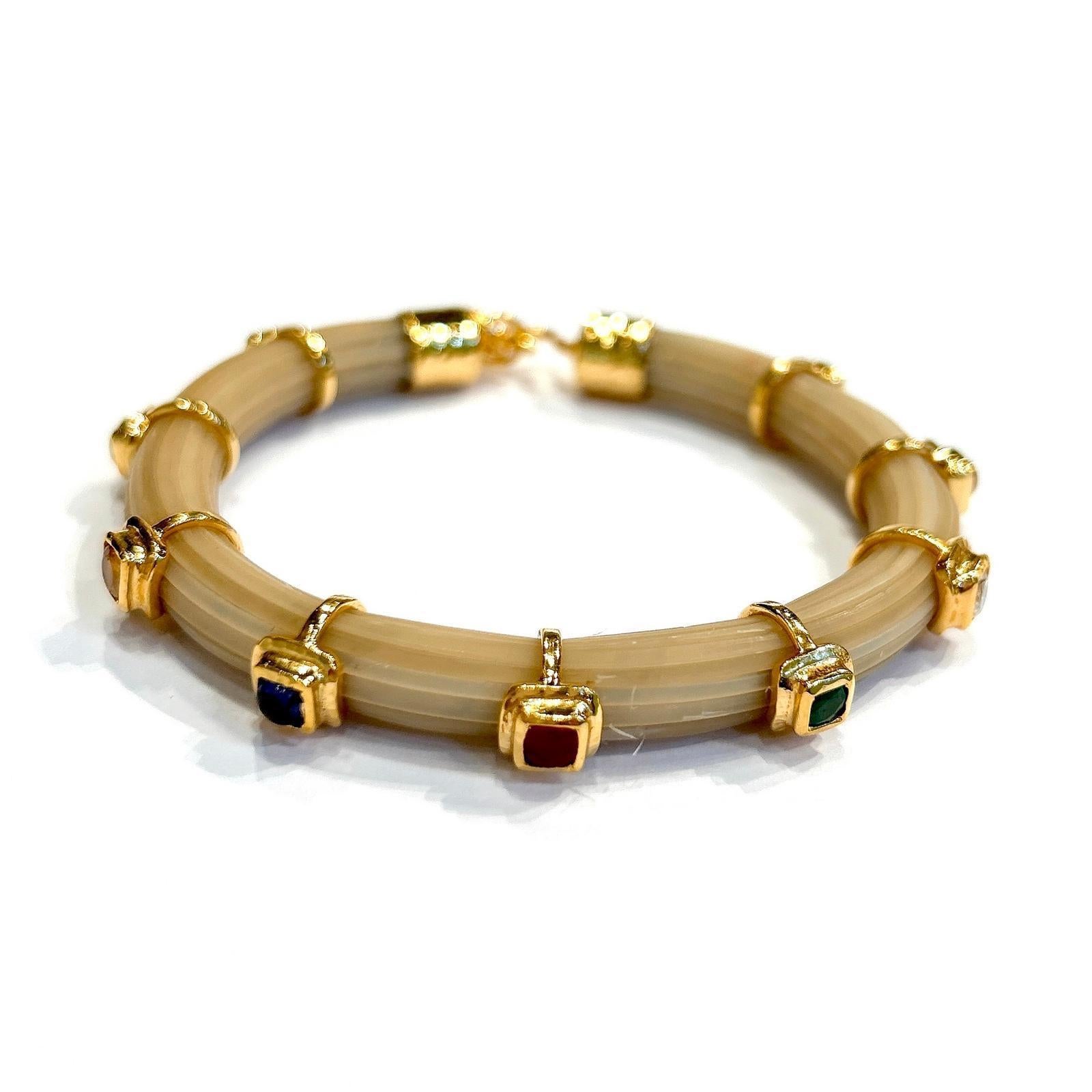 Set di bracciali con rubini e zaffiri multicolore in oro e argento 18 carati di Bochic 