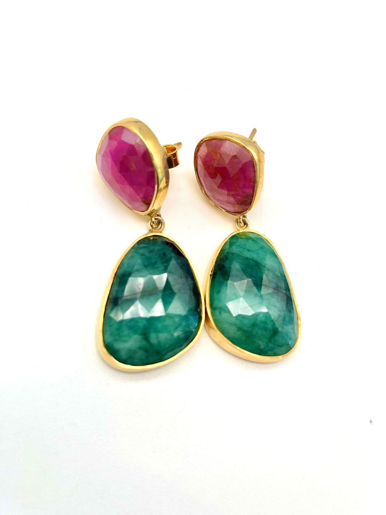 Bochic “Capri” Ruby & Multi Rough Cut Emeralds Set In 18K Gold & Silver 

Natural Ruby from Africa
Natural Emeralds from Africa 
14 Carat

The earrings from the 