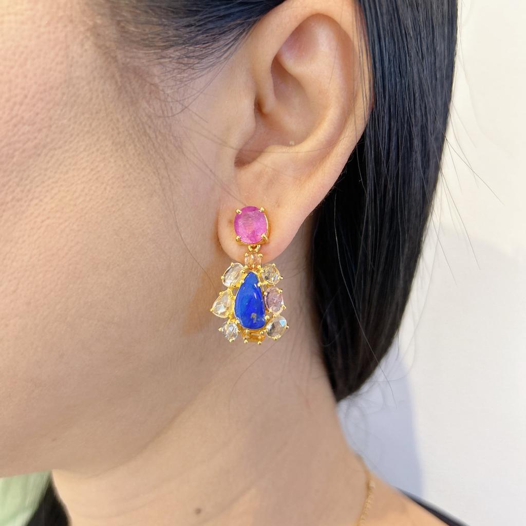 Bochic “Capri” Ruby, Opal & Rose Cut Sapphire Earrings Set In 18K Gold & Silver 
Red Ruby, Oval shape - 8 Carat
Fire Blue Opal - 13 Carat
Rose Cut Multi color Sapphire from Sri Lanka - 7 Carat

The earrings from the 