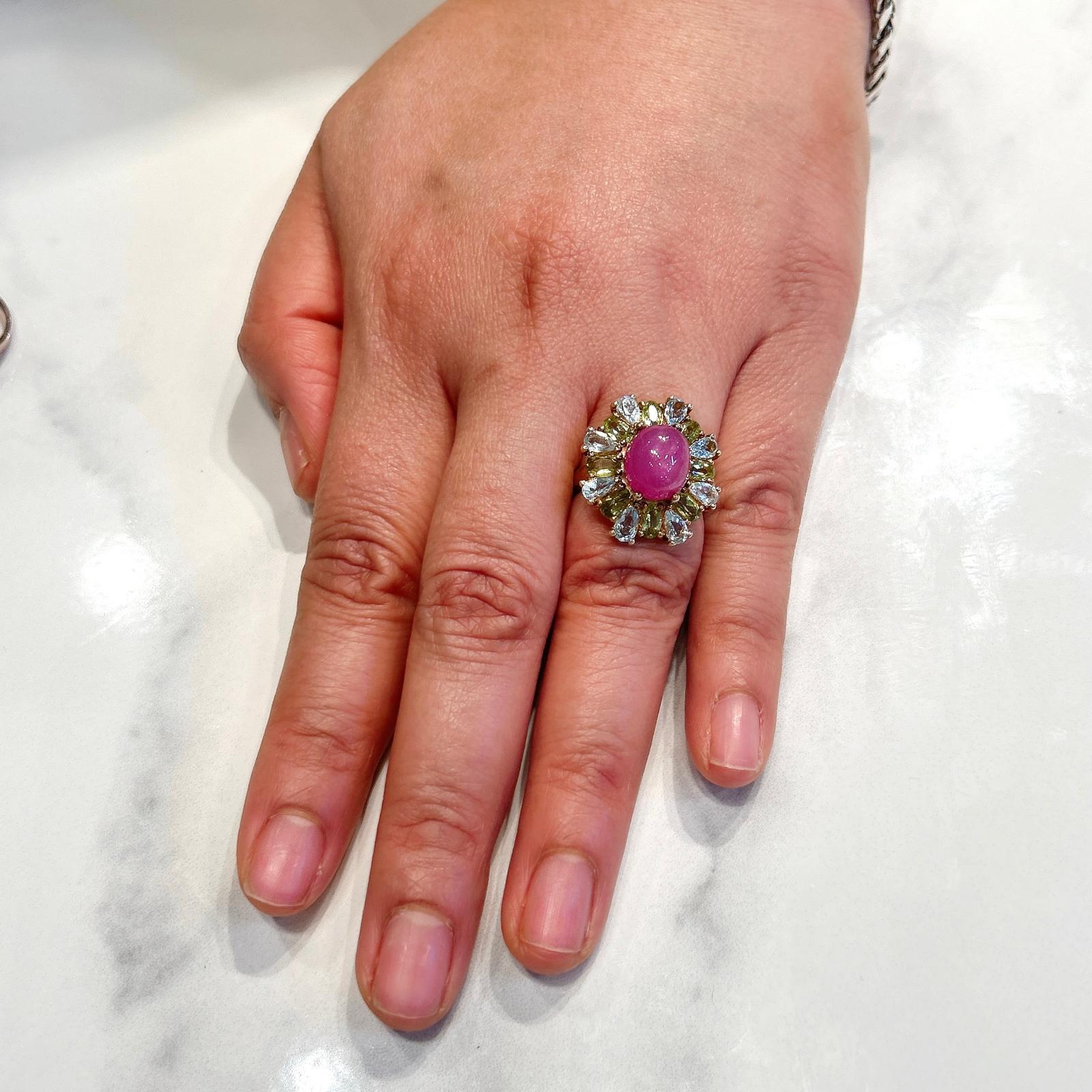 Bochic “Capri” Ruby, Topaz & Peridot Cocktail Ring Set 18K Rose Gold & Silver 

Natural Ruby  - 9 Carats 
Natural Blue Topaz - 2 Carats 
Natural Peridot - 3 Carats 

This Ring is from the 