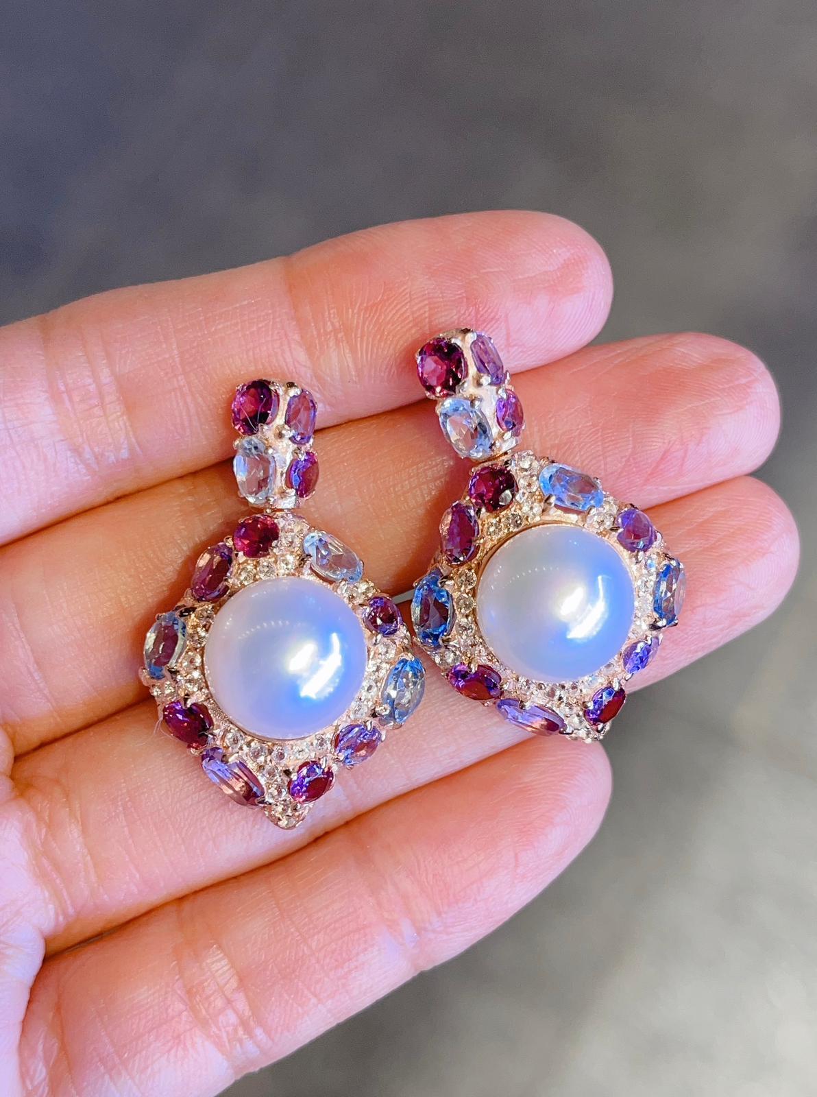 Bochic “Capri” Multi Fancy color Natural Gem Earrings 
Natural Blue Topaz - 4 Carats 
Natural White Topaz - 4 Carats 
Natural Amethyst - 4 Carats 
Natural Rodorite - 4 Carats 
South Sea cultured White Australian Pearls 
Set in 22K Gold and Silver