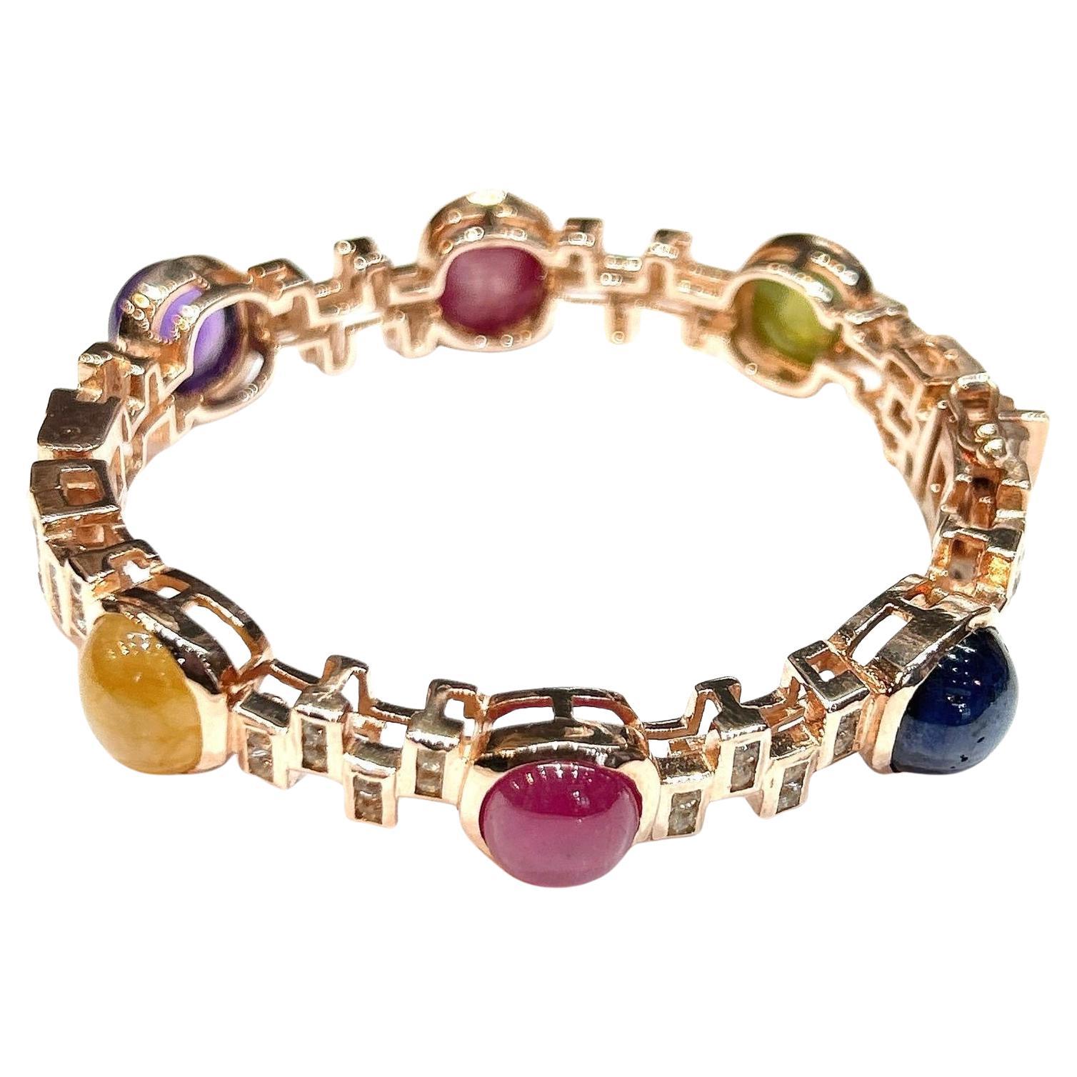 Bochic “Capri” Vintage Diamond, Ruby & Multi Color Sapphire Bangle Set In 18K & Silver 

Blue Sapphire - 5 Carats 
Yellow Sapphire- 5 Carats 
Red Ruby - 3 Carats 
Green Sapphire - 3 Carats 
Diamond - 2 Carats 
Purple Amethyst - 4 Carats 

The Bochic