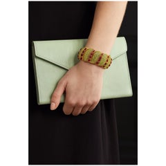 Conjunto de brazalete vintage "Capri" de rubí natural y peridoto en oro de 18 quilates y plata