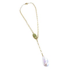 Collares con gota de granate