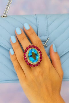 Anello Vintage By "Capri" con rubino, topazio blu e diamanti incastonati in oro e argento 18 carati