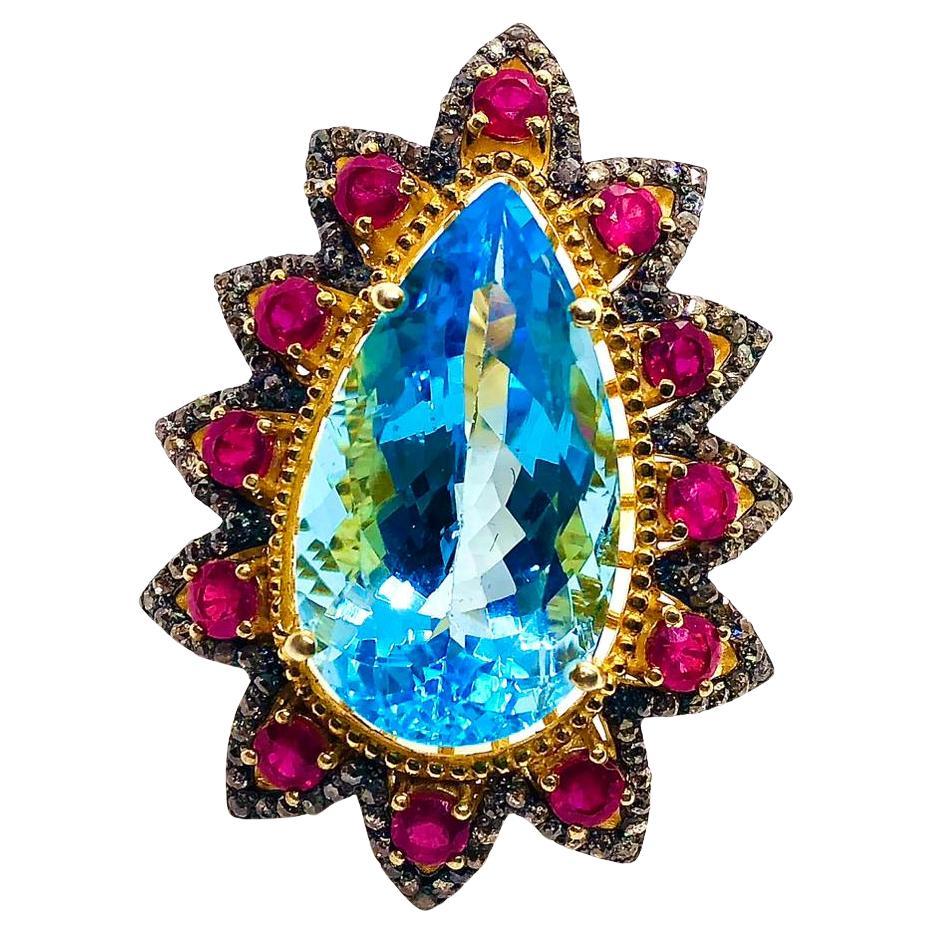 Anello Vintage By "Capri" con rubino, topazio blu e diamanti incastonati in oro e argento 18 carati