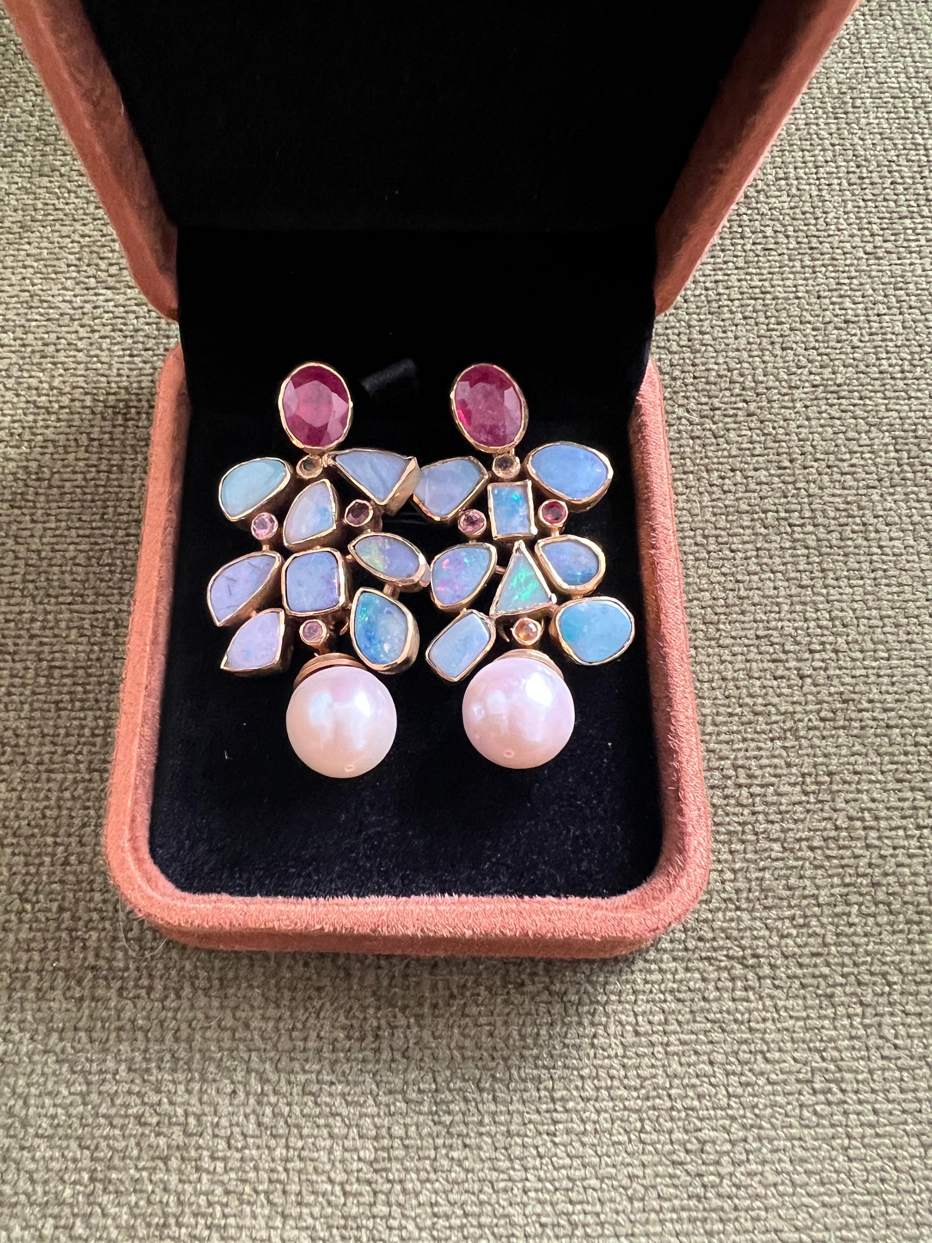 Bochic “Capri�” Vintage Ruby & Multi Pastel Opals Earrings Set In 18K Gold & Silver 

Natural Ruby Oval Shape from Africa
8 carats 
Natural Pastel color Opals 
4 Carat 
Natural Red Rubies

The earrings from the 
