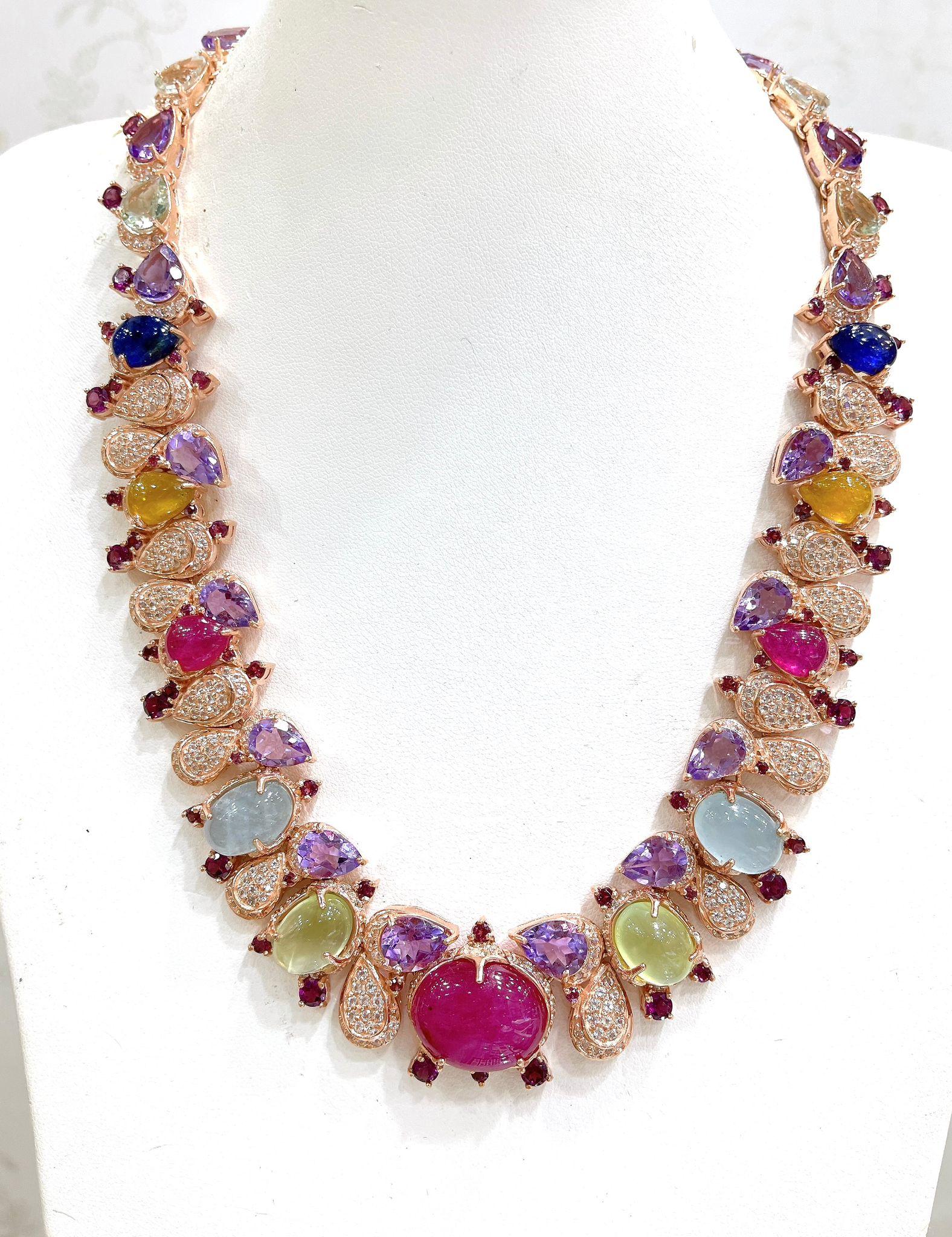 Bochic “Capri�” Vintage Natural Ruby, Sapphire, Amethyst, Aquamarine & Peridot - Necklace and Earrings Set

Made in 18K Gold & Silver 

Ruby - 31 Carats 
Green Peridot  - 11 Carats 
White Topaz - 14 Carats 
Sapphires - 4 Carats 
Purple Amethyst -11