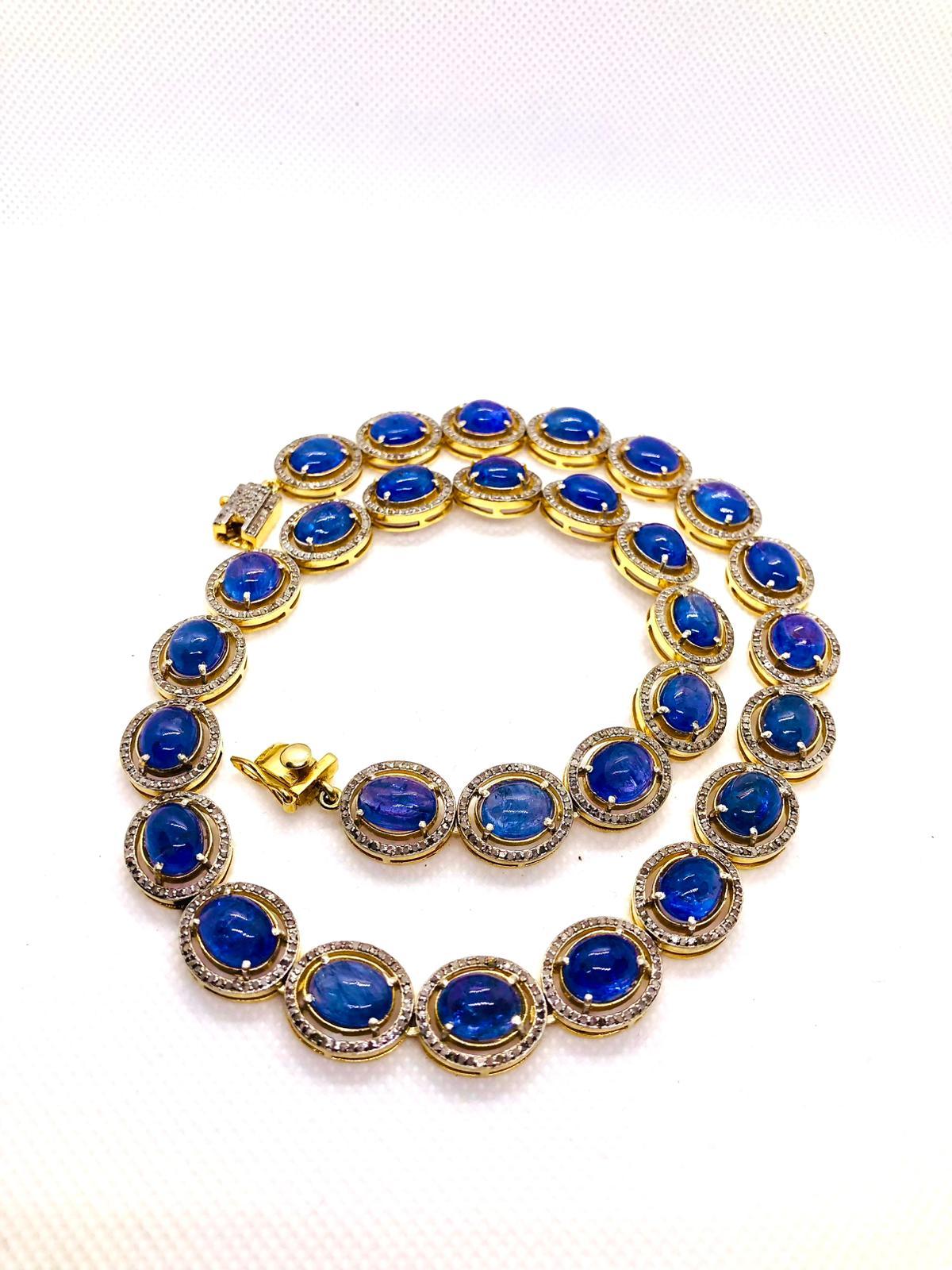 Bochic ��“Capri” Vintage Tanzanite 
Diamond Necklace Set 18K Gold 
Silver 

Elegant and Classic Italian style 

Natural Tanzanite  - Approx 100 Carats 
Natural Diamonds - 5 Carats 

The Bochic 