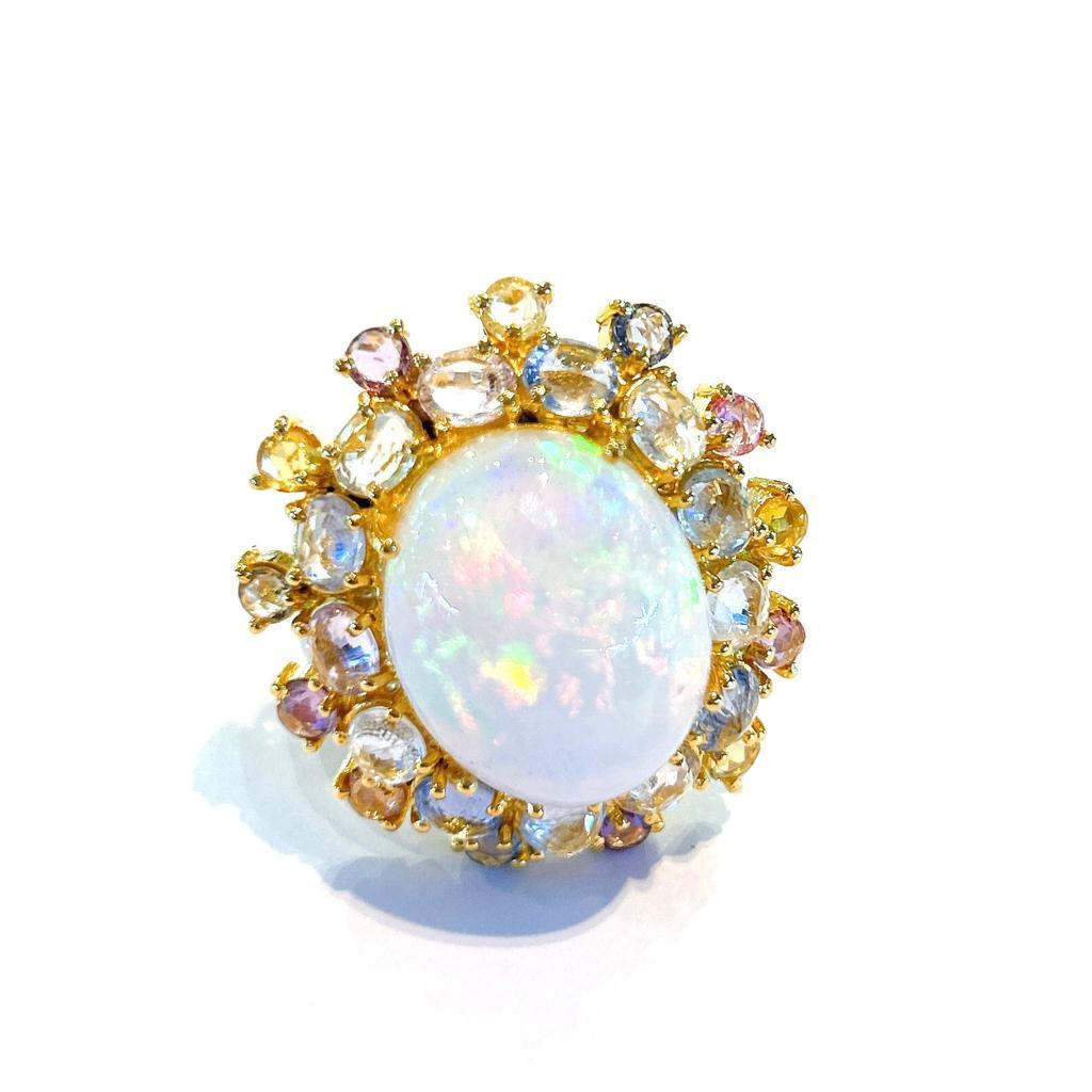 Bochic “Capri” Blue & Multi color Sapphires Ring Set in 18K Gold & Silver 
Natural White Fire Opal Cabochon - 12 Carats 
Natural Multi Pastel color sapphires from Sri Lanka, round rose cut  shapes - 14 carats 

This Ring is from the 