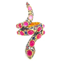 Bochic “Orient” Cleopatra Serpent Ruby Ring and Fancy Sapphires Set in 22K Gold 