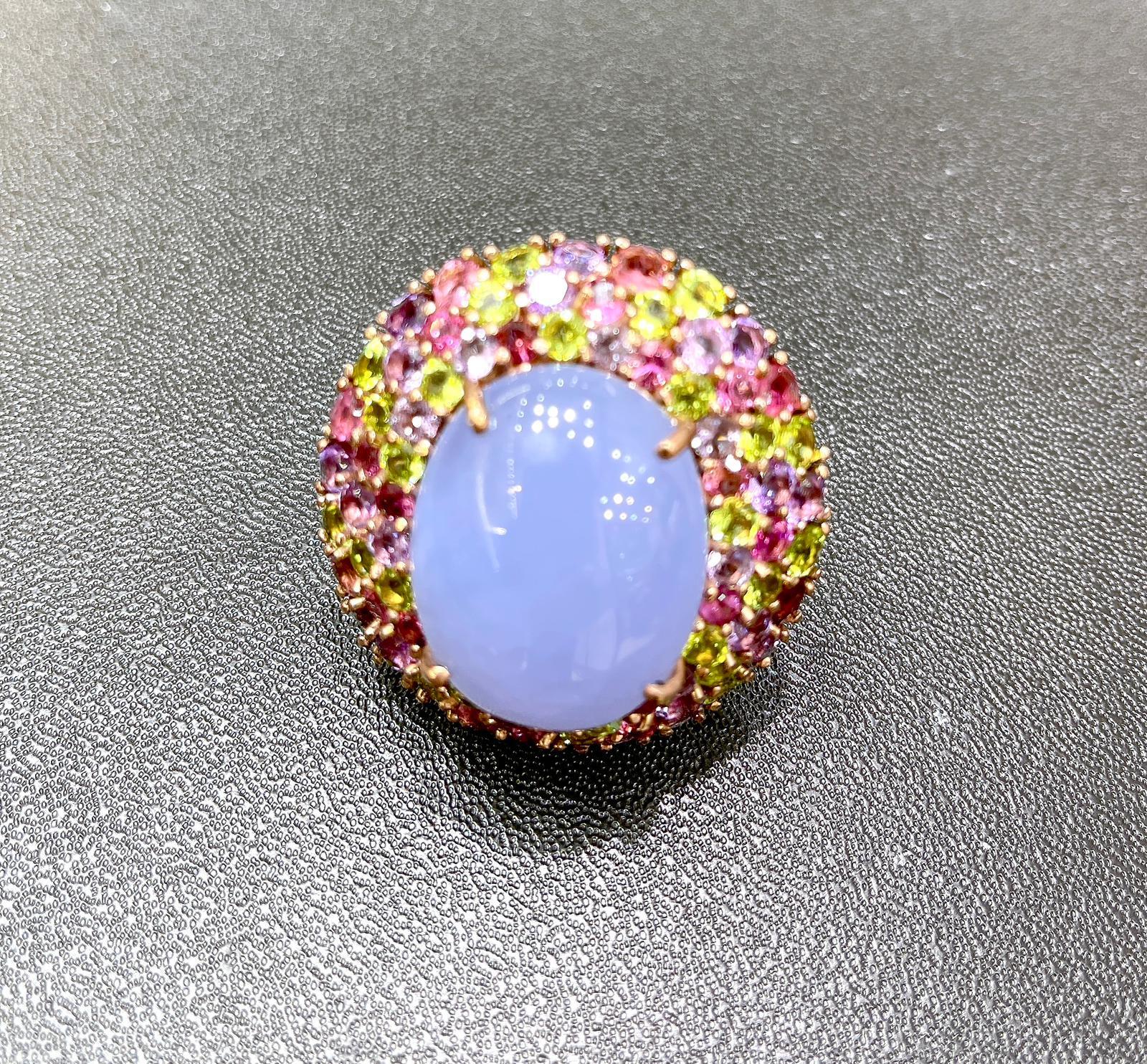 Bochic “Flamenco” chalcedony Fancy Multi Color Gems Large Cocktail Ring 18K Gold & Silver

chalcedony - 12 Carat 
Cluster Multi Color Fancy Gems from Sri Lanka
Amethyst - 1 Carat 
Peridot - 1 Carat 
Rohodlight - 1 Carat 
Sapphire - 1 Carat 

This