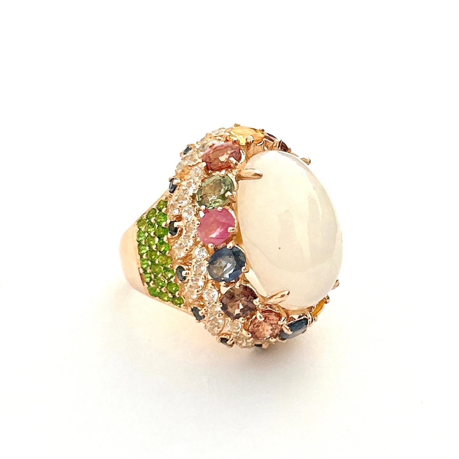 Bochic “Flamenco” Opal & Multi Fancy Color Sapphires Cocktail Ring 18K Gold

Opal - 12 Carat 
Cluster Multi Color Fancy Gems from Sri Lanka
4 Carat 
Peridot - 1 Carat 
White Topaz 1 Carat 
Blue Sapphire - 1 Carat 

This Ring is from the  “Flamenco” 