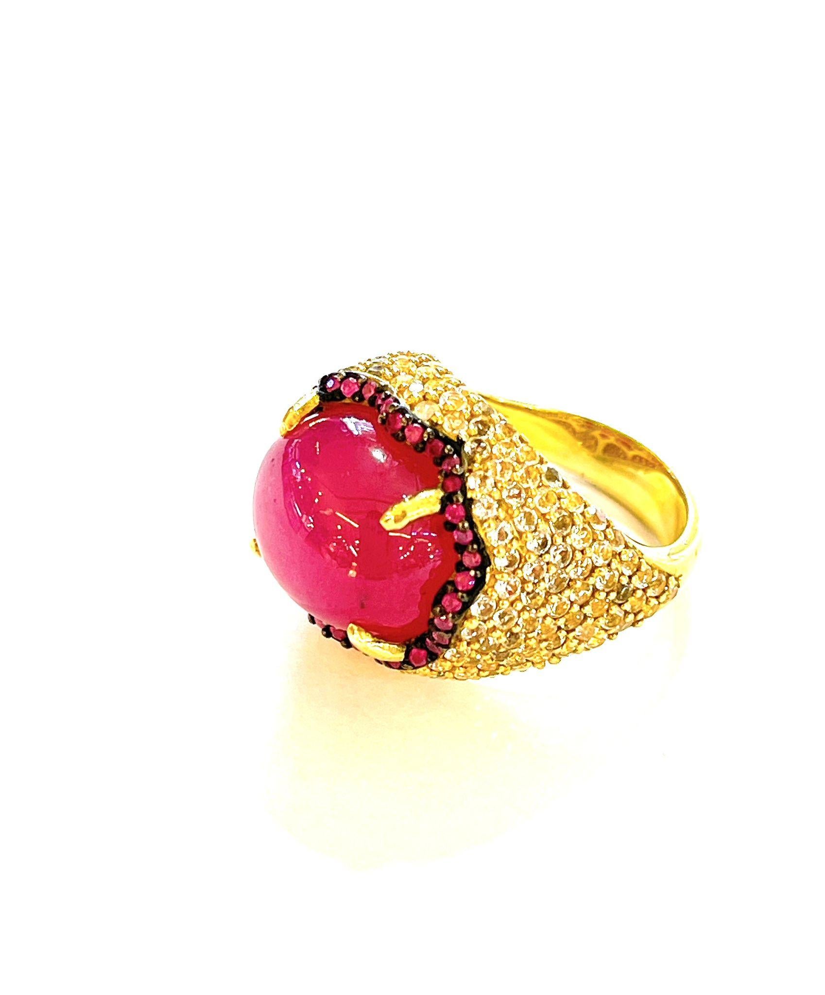 Bochic “Flamenco” Ruby & White Zircon Cocktail Ring 18K Gold & Silver

Natural Ruby star and Ruby Cabochon from Sri Lanka  - 17 Carat
White Zircon - 2 Carat 

This Ring is from the 