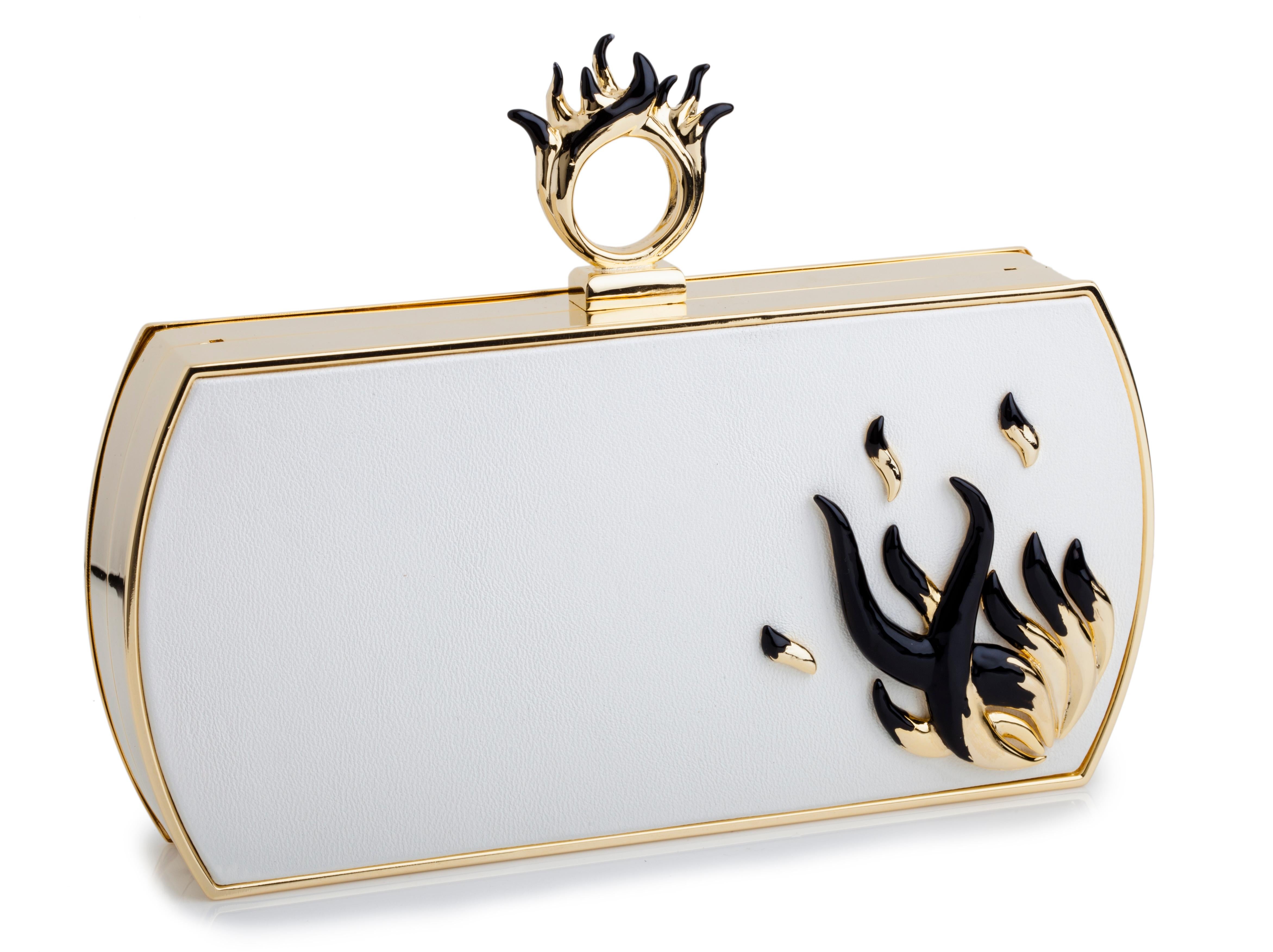 Bochic “Gilda” Jeweled clutch. 
The “Gilda” clutch in honor of the beautiful, alluring and provocative Rita Hayworth in the 1946 romantic drama “Gilda”. A seductive and 
desirable woman, who knows what she wants and how to achieve it. 
This clutch