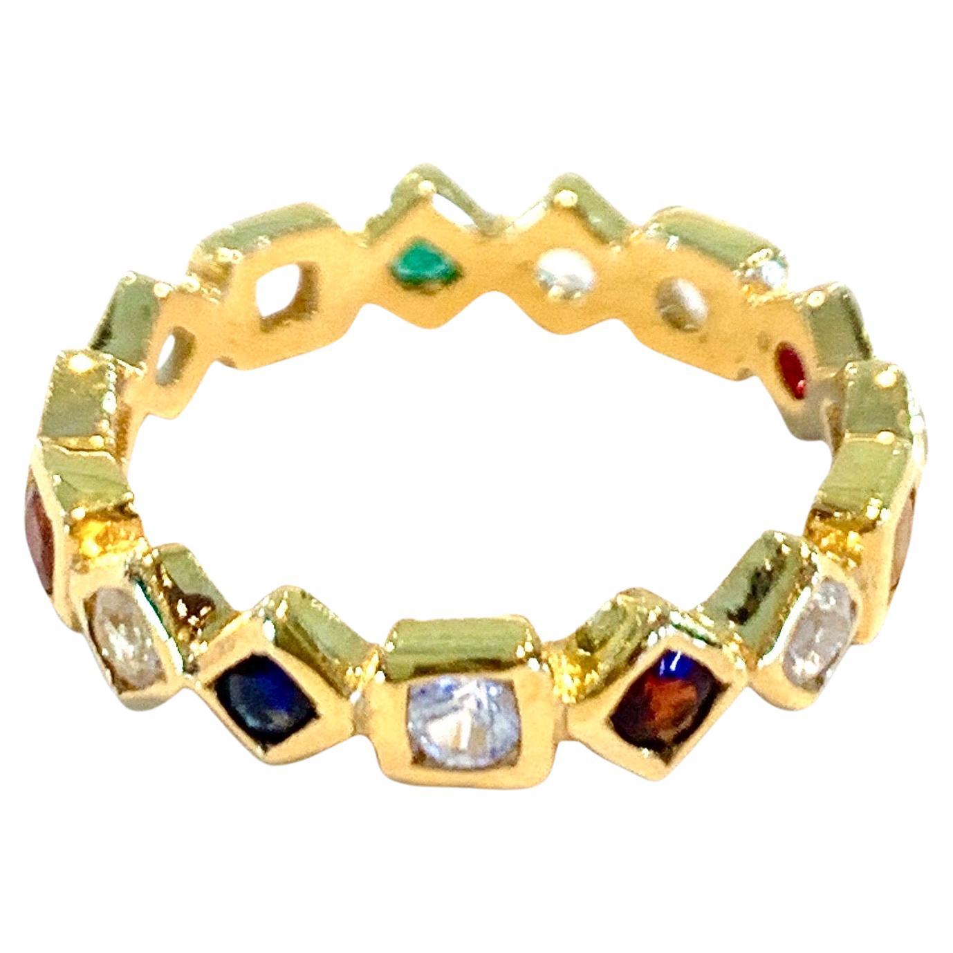 Bochic Good Luck Gem Charm Band 
The believe that wearing Nine-gems ring will bring a good fortune prosperity and luck to the wearer.
Nine- gems are comprised of diamond, ruby, emerald, yellow sapphire, blue sapphire, moonstone, zircon and cat's